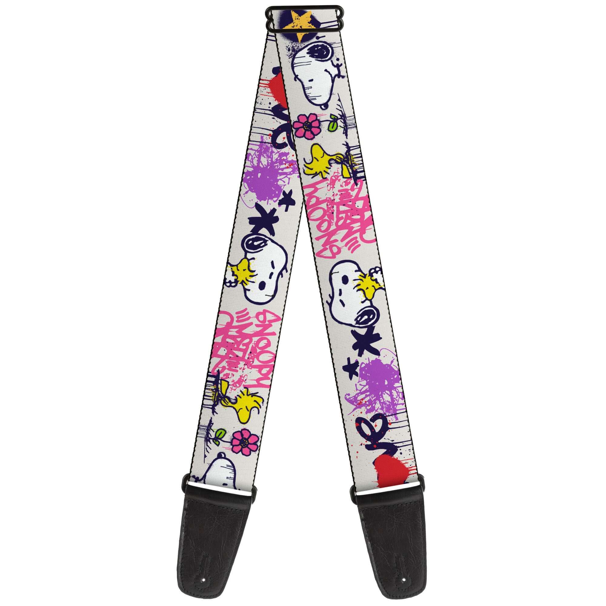 Buckle Down Snoopy and Woodstock guitar strap featuring colorful designs of Snoopy, Woodstock, and playful graphics.