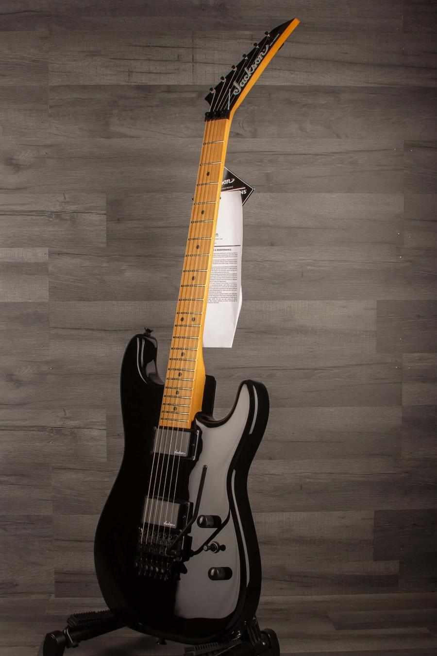 Jackson Pro Origins 1985 San Dimas SD1 HH FR, Maple Fingerboard, Gloss Black guitar on display.