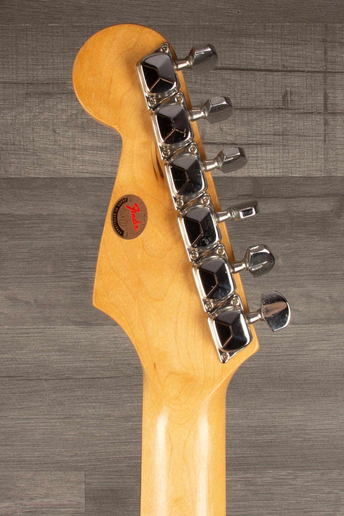 USED - Squier Stratocaster s/b guitar headstock with chrome tuners and rosewood board.
