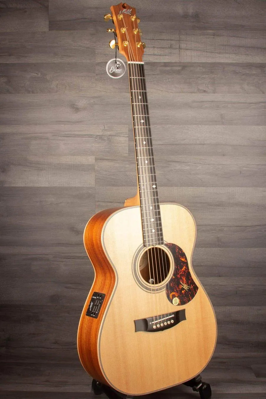 USED - Maton EBG808ART Artist - Acoustic Guitar displayed in excellent condition on a wooden background.