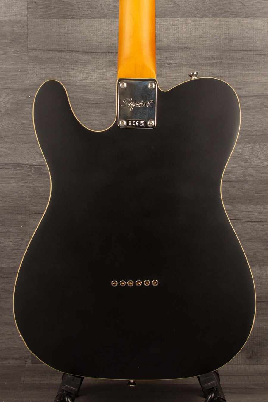 Back view of the Squier Classic Vibe Baritone Custom Telecaster, Satin Black finish, showcasing its unique Telecaster design.