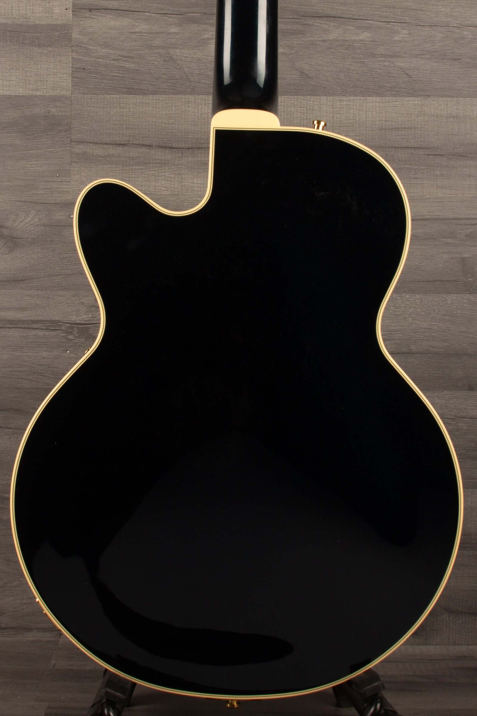Back view of Gretsch Broadkaster Jr. LX Center Block guitar, showcasing sleek black finish and elegant design.