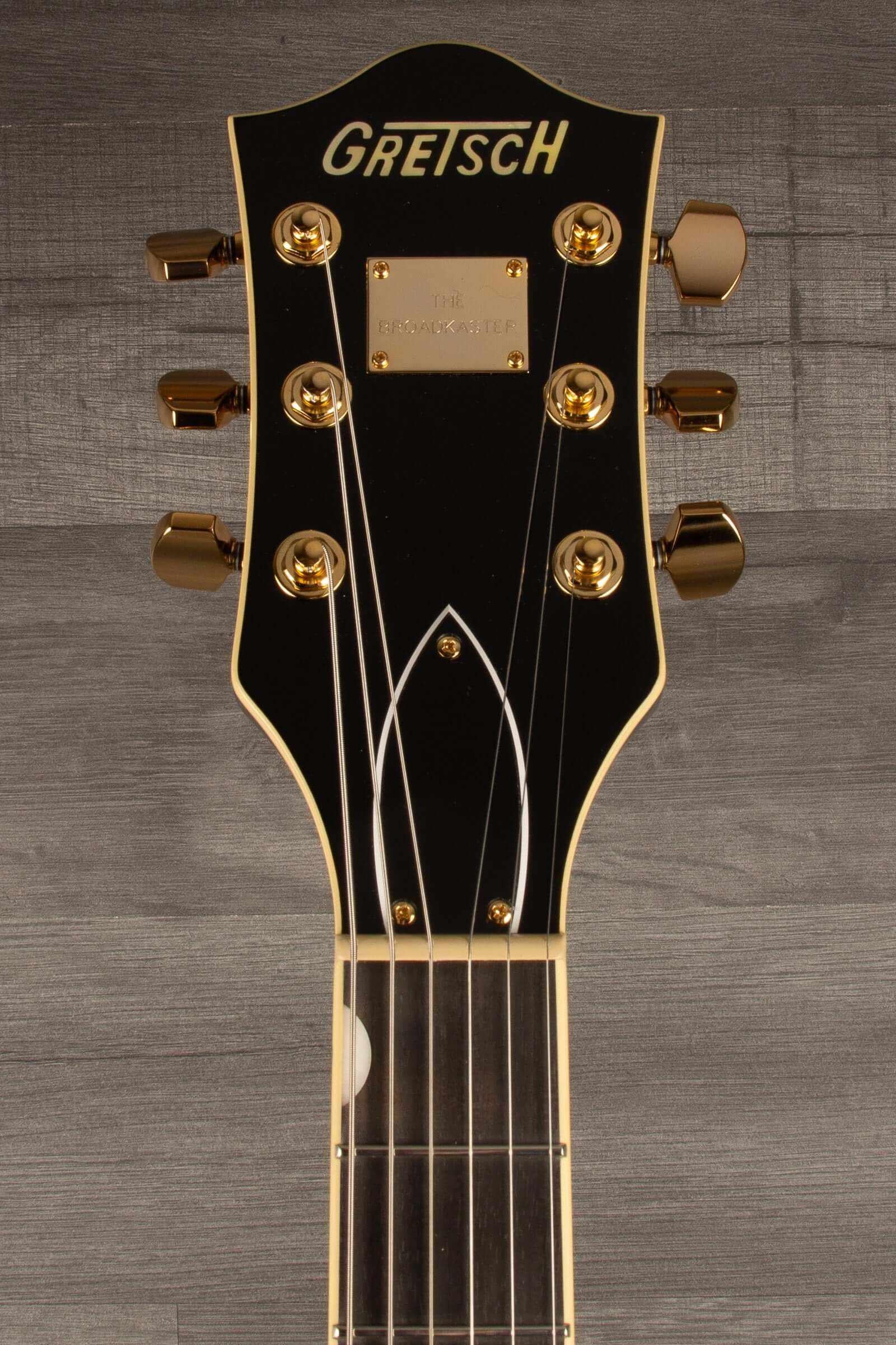 Gretsch Broadkaster® Jr. LX Center Block guitar headstock with gold hardware and ebony finish.