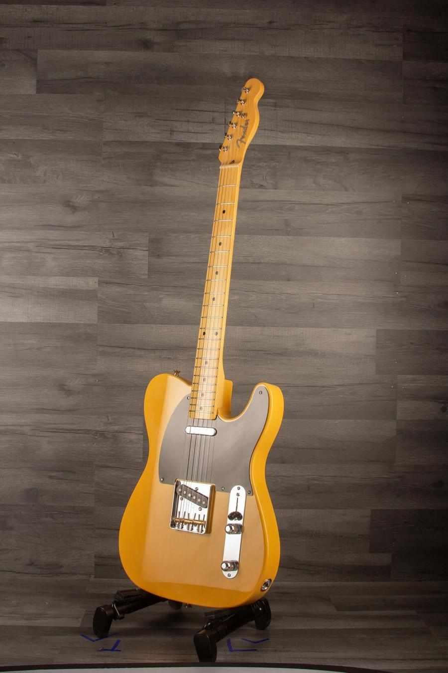 USED Fender Japanese Traditional II 51 Nocaster Butterscotch Blonde guitar on display, featuring a gloss finish and black pickguard.