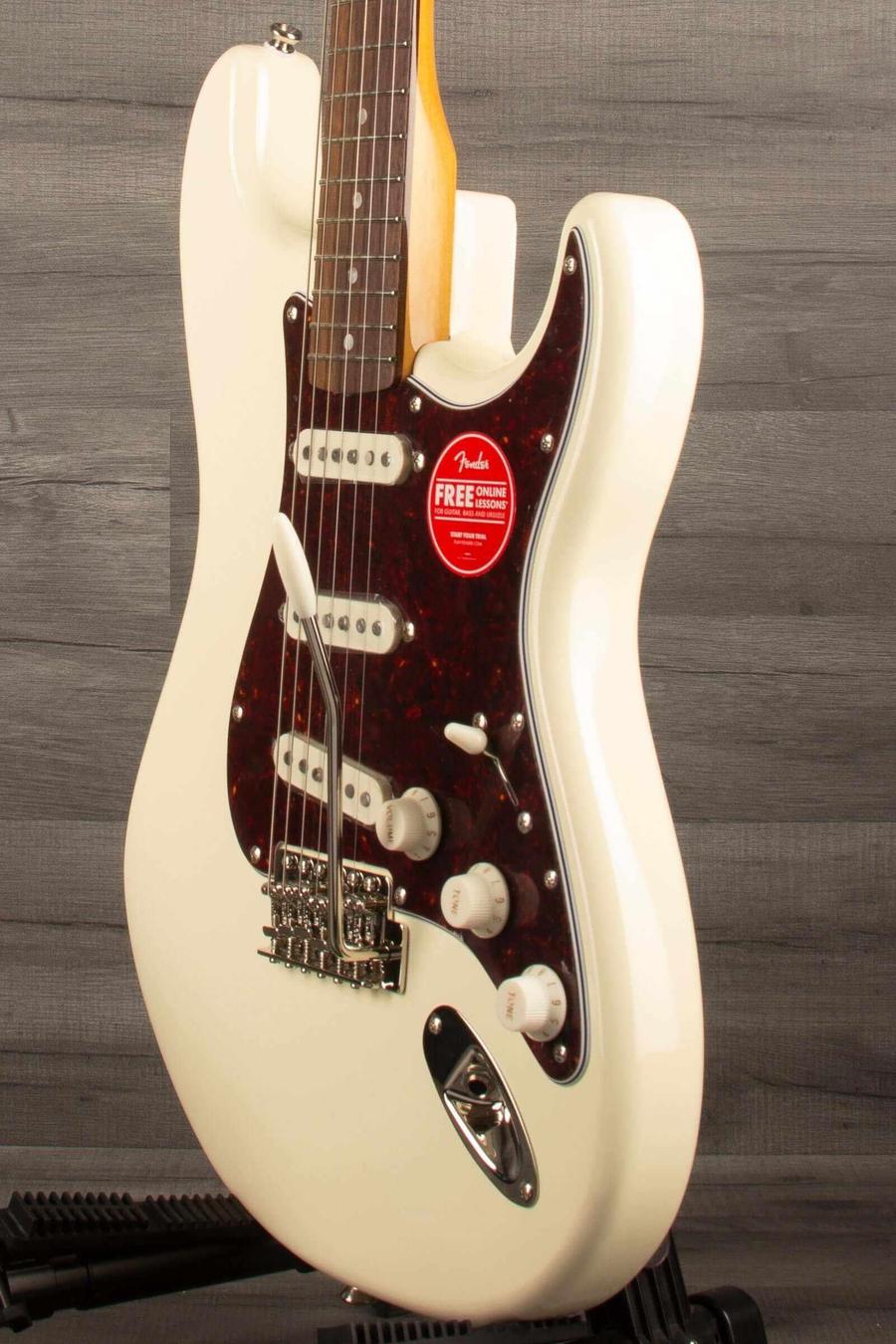 Squier FSR Classic Vibe '60s Stratocaster in Olympic White showcasing pickups and tremolo system.