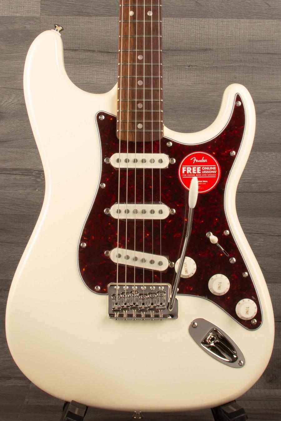 Squier FSR Classic Vibe '60s Stratocaster in Olympic white with three single-coil pickups and vintage-style tremolo.