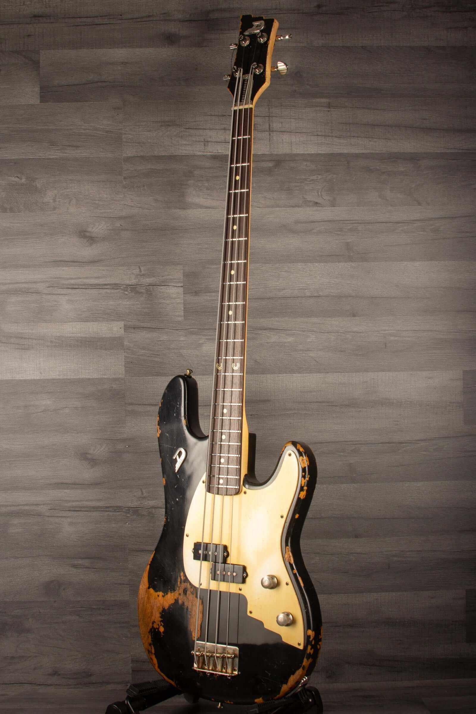 Duesenberg Chris Chaney Bass Black Distressed LTD showcasing its sleek design and innovative features.