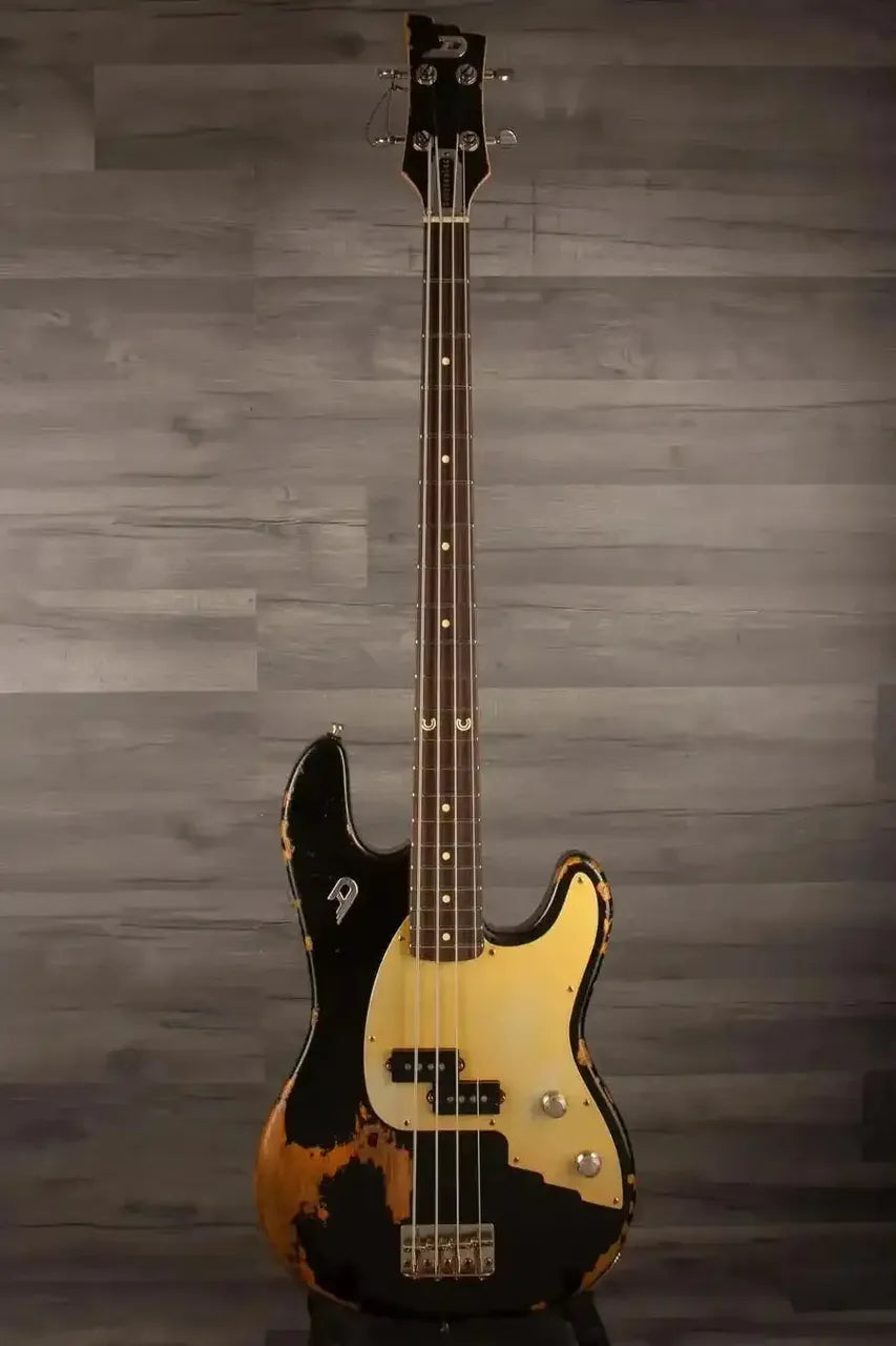 Duesenberg Chris Chaney Bass Black Distressed LTD showcasing its vintage look and unique design features.
