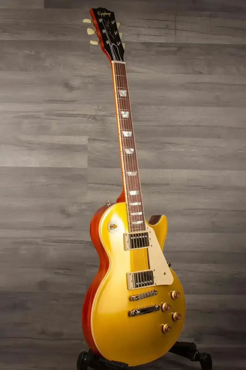 Epiphone 1957 Les Paul Goldtop Reissue electric guitar with a vintage gold finish and mahogany body.