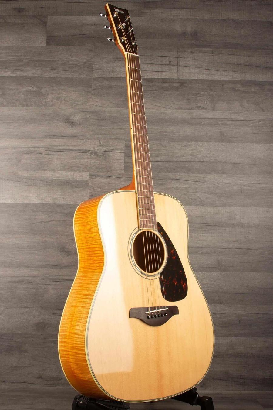 Yamaha FG840 Acoustic Guitar - Natural showcasing its superb scalloped bracing and beautiful natural wood finish.