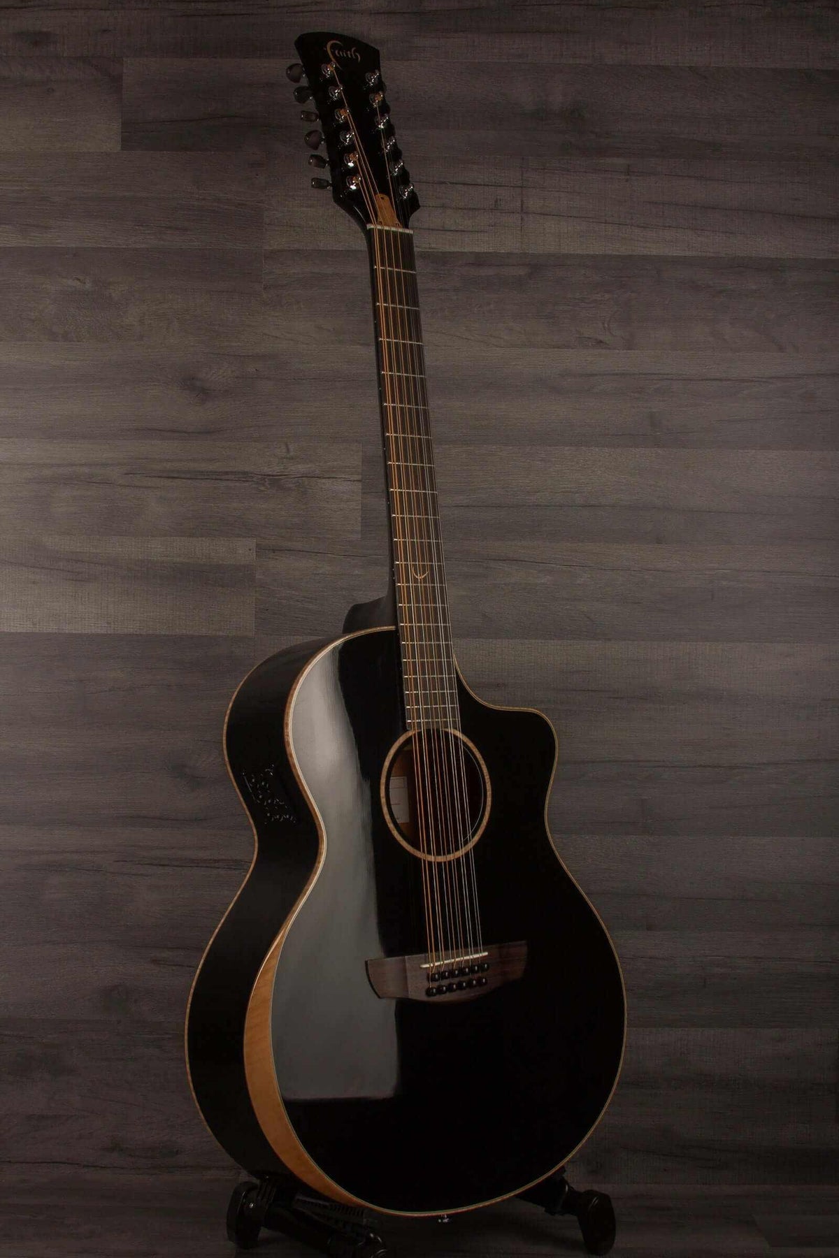 Faith ECLIPSE Series Neptune 12string CE Inc Case acoustic guitar in black finish against a wooden background.
