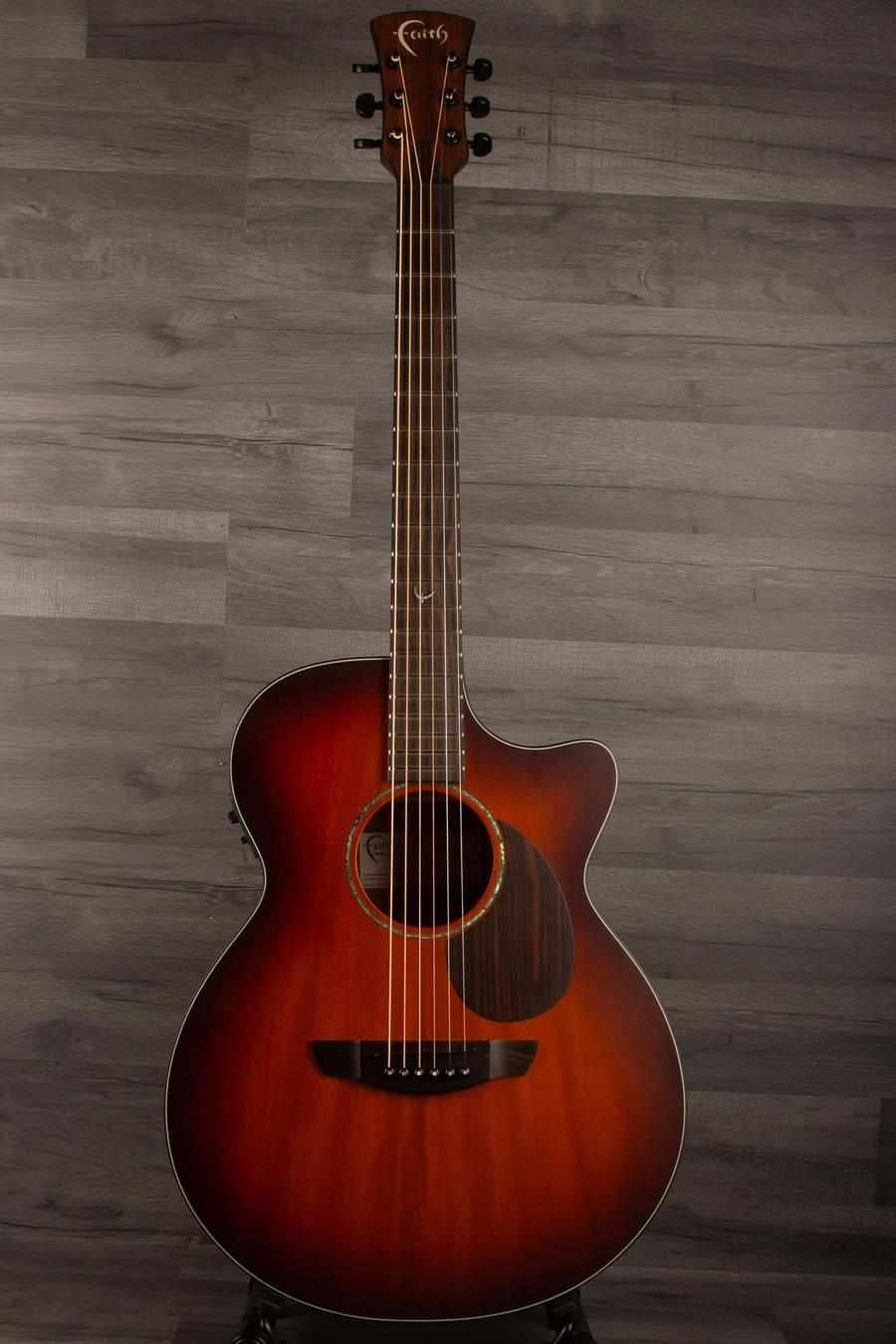 USED - Faith Nexus Venus - Solar Flare guitar with Solar Flare Burst finish on a wooden background.