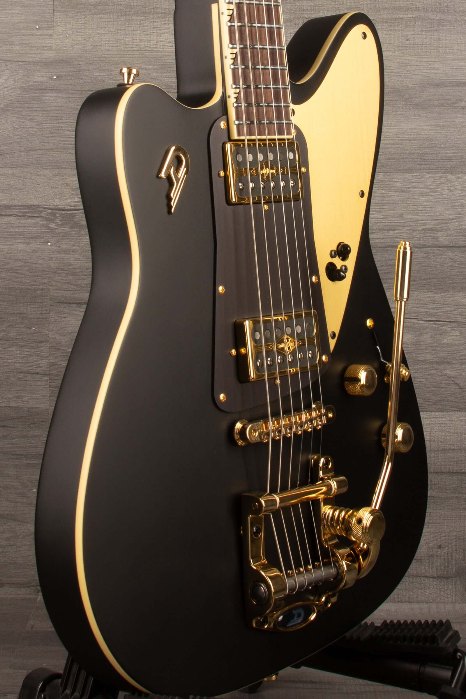 Duesenberg Falken Tremola , Electric Guitar - Matte Black with gold hardware and unique body shape.