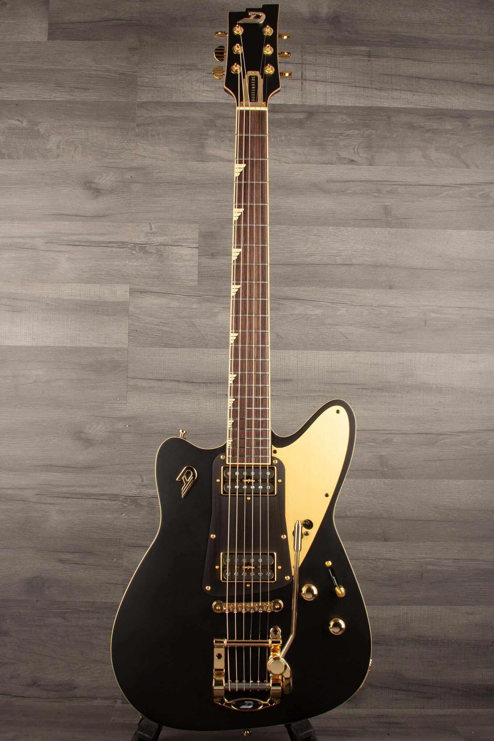 Duesenberg Falken Tremola , Electric Guitar - Matte Black with gold hardware and unique body shape.