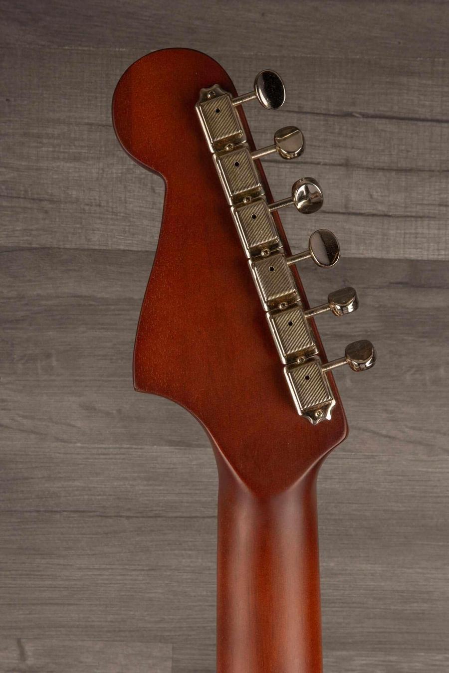 Fender Malibu Player special All mahogany guitar headstock with tuning pegs against a wooden background.