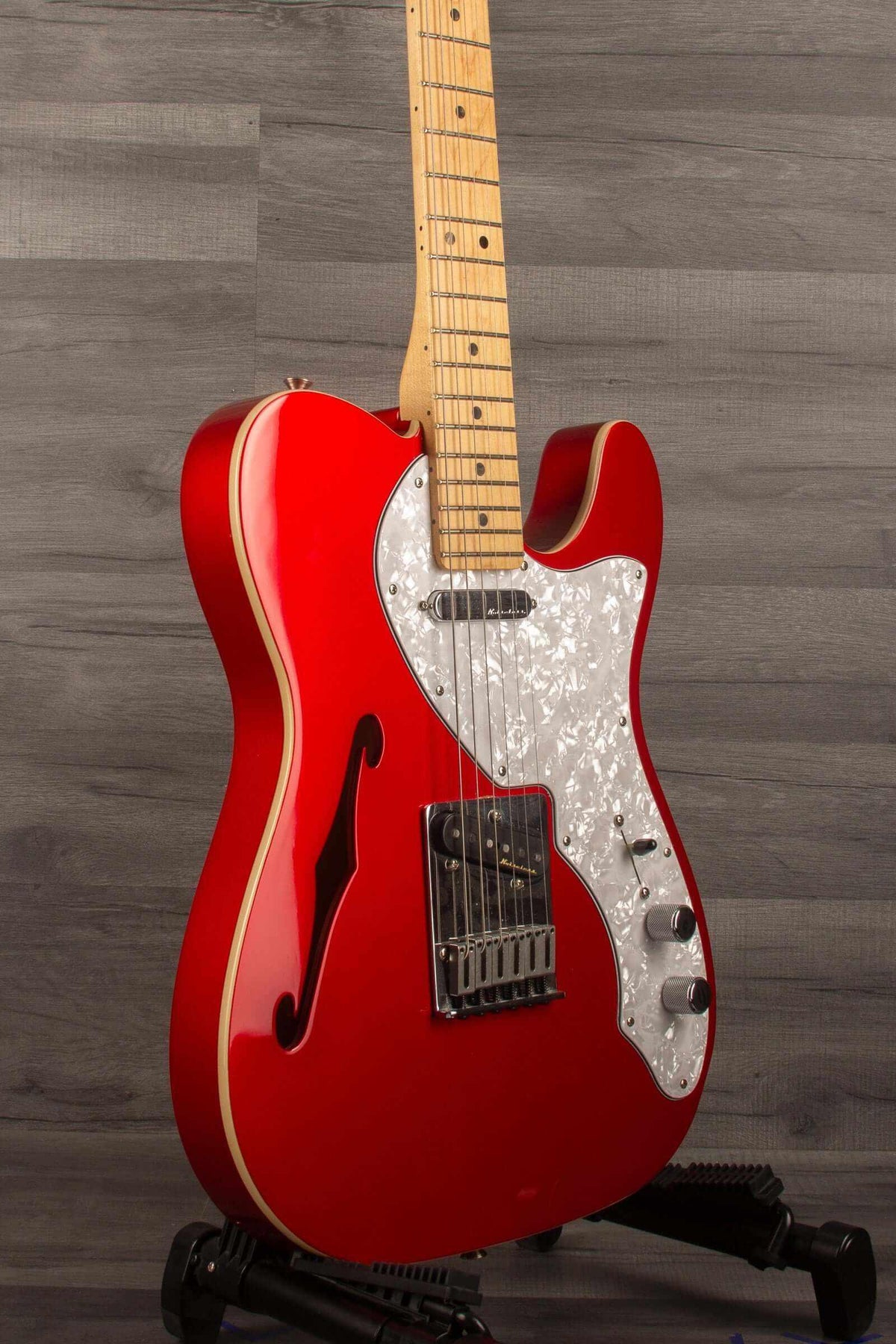 USED - Fender Deluxe Telecaster Thinline, Maple Fingerboard, Candy Apple Red on display.