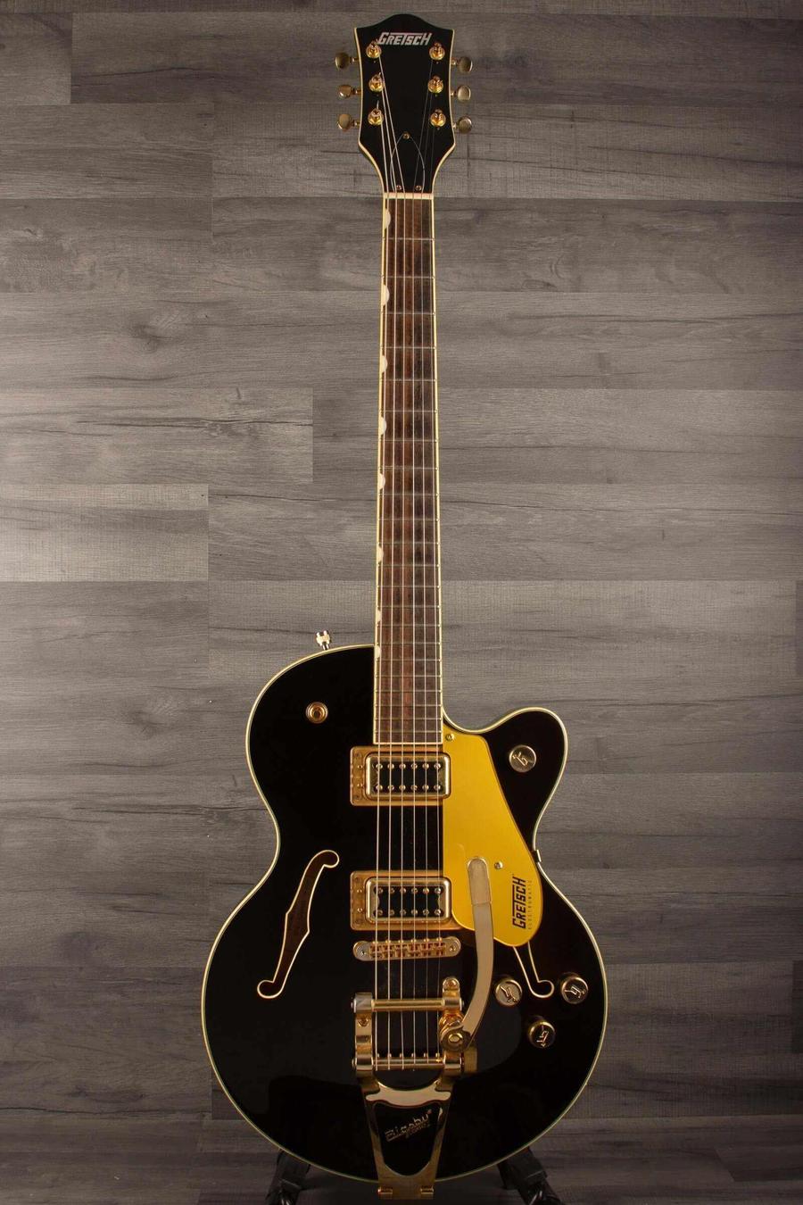 Used Gretsch G5655TG Electromatic Center Block Jr in black with gold hardware, showcasing its iconic design and classic appeal.