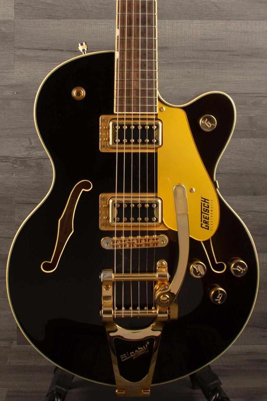 USED - Gretsch G5655TG Electromatic Center Block Jr. guitar with striking black and gold finish, showing light wear.