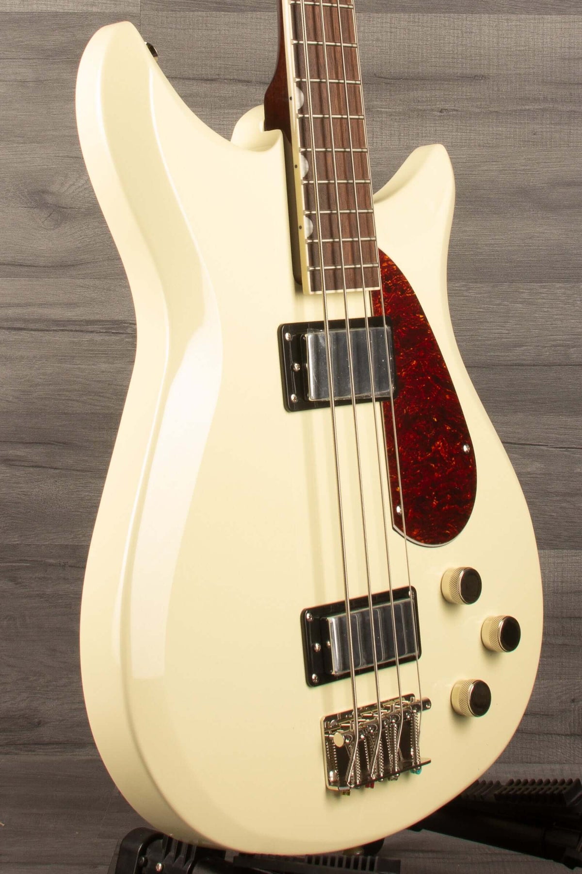 Gretsch Electromatic® CVT Bass Double-Cut, Laurel Fingerboard, Vintage White side view on display