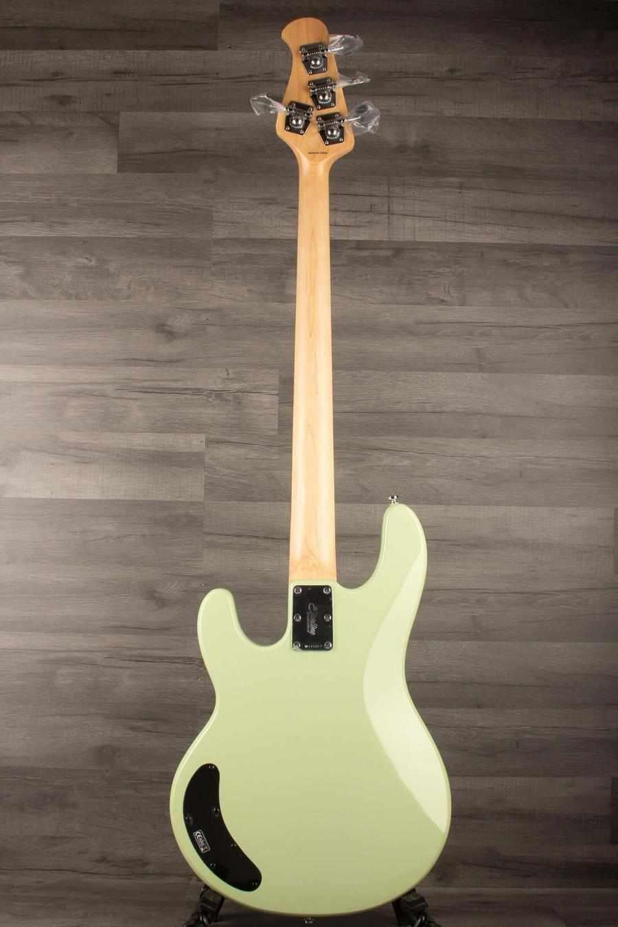 Sterling Stingray Intro series Bass Guitar - Misty Green back view showcasing the contoured body and design.