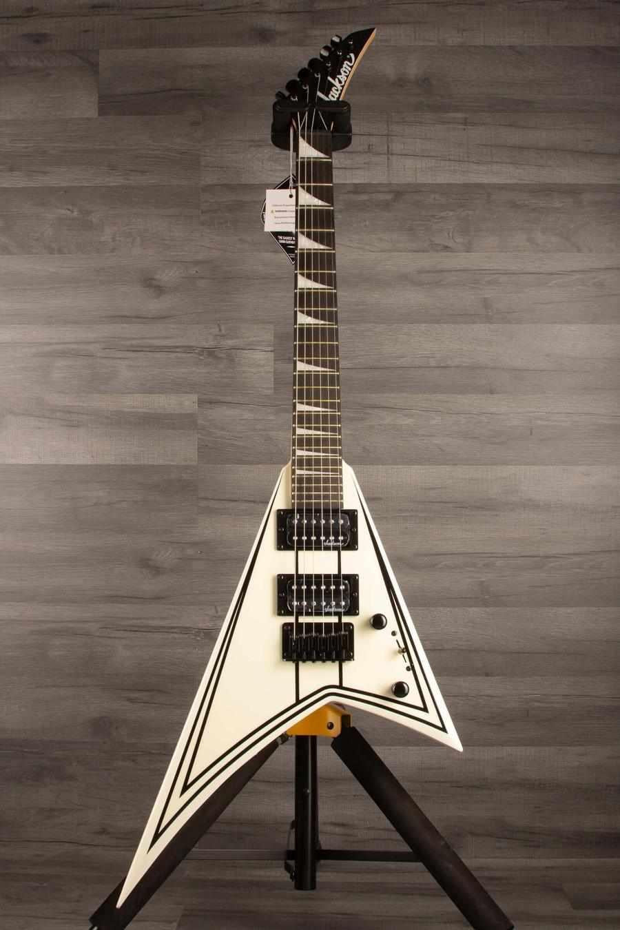 Jackson JS Series RR JS1XM Minion Electric Guitar - Snow White with black hardware and Jackson pointed 6-in-line headstock.