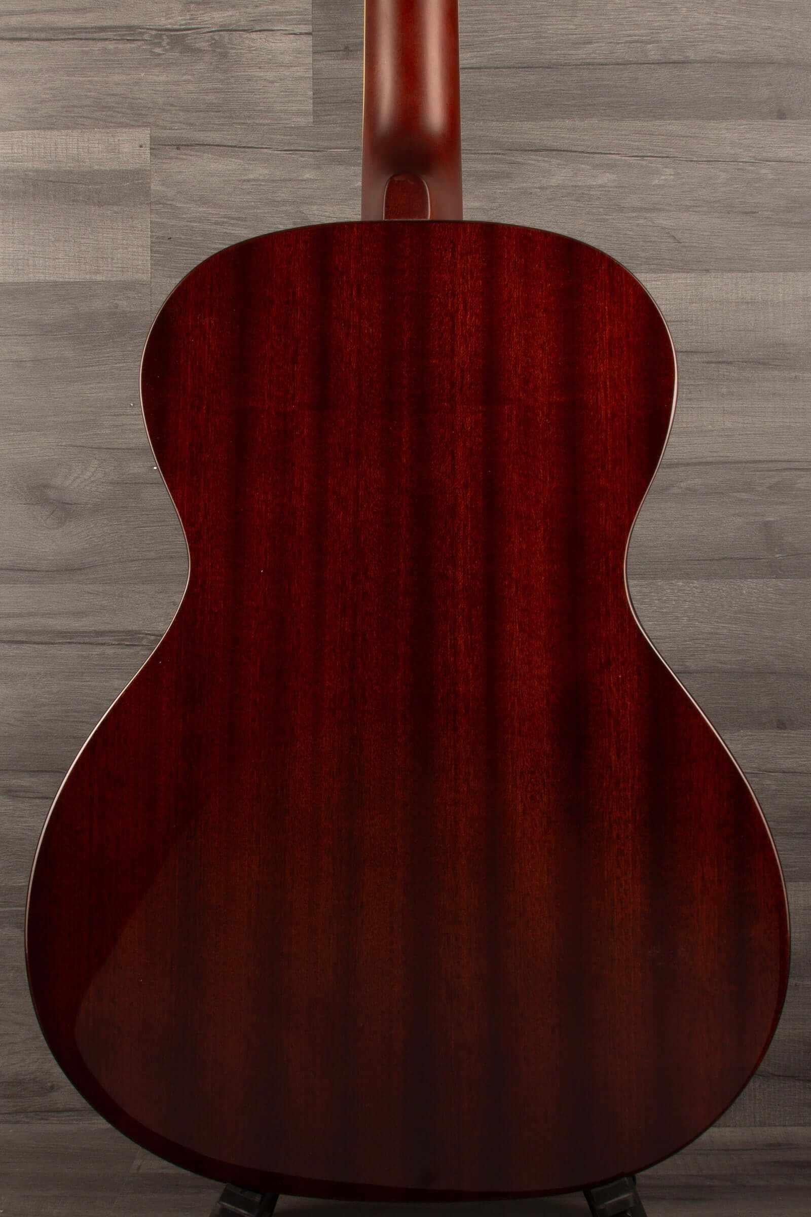 Back view of Gretsch Jim Dandy™ Concert LTD acoustic guitar showing rich walnut finish and smooth curves.