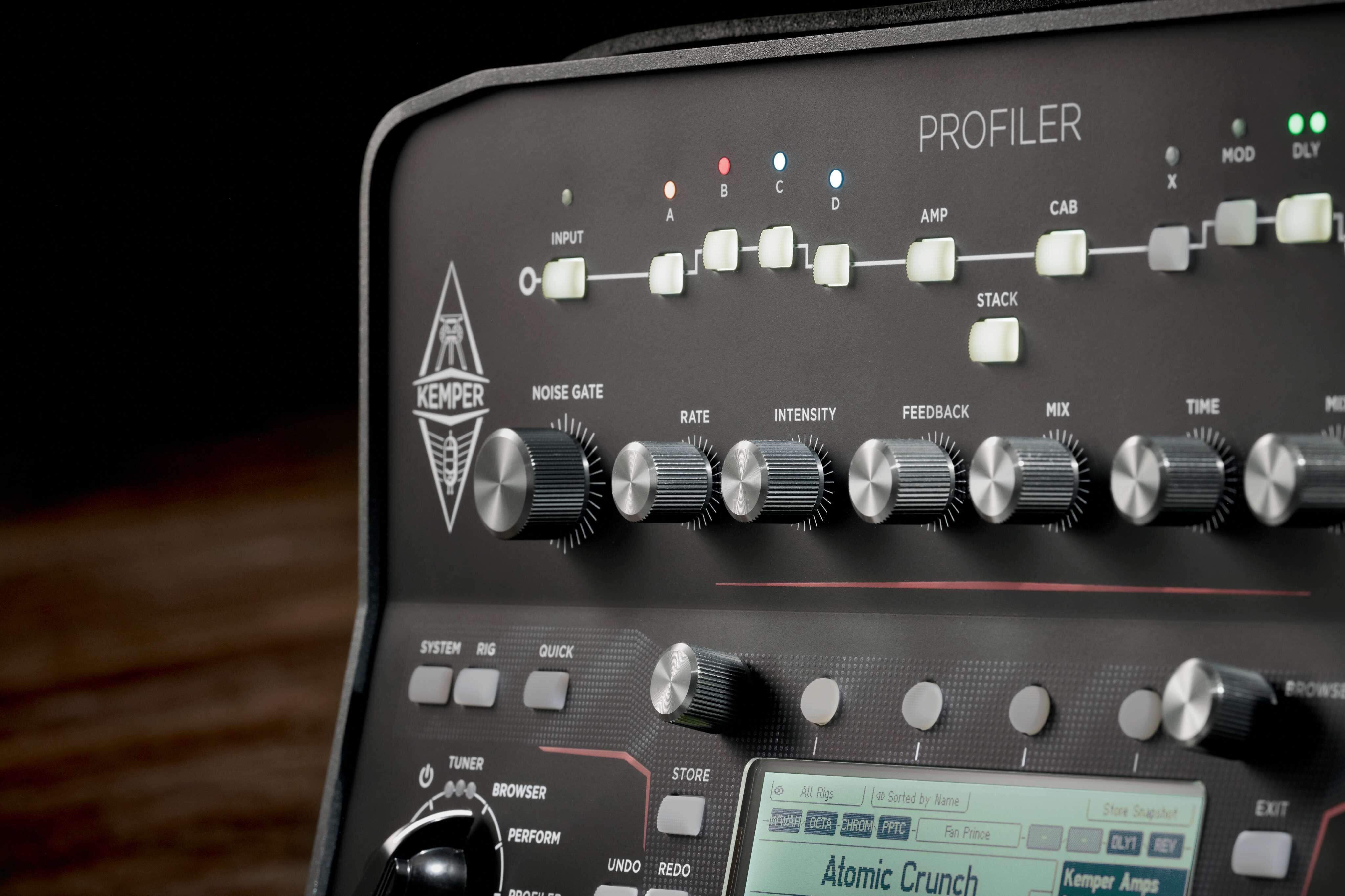 Close-up of Kemper Profiler Head Guitar Amp MKII showcasing dials and interface for tone shaping.