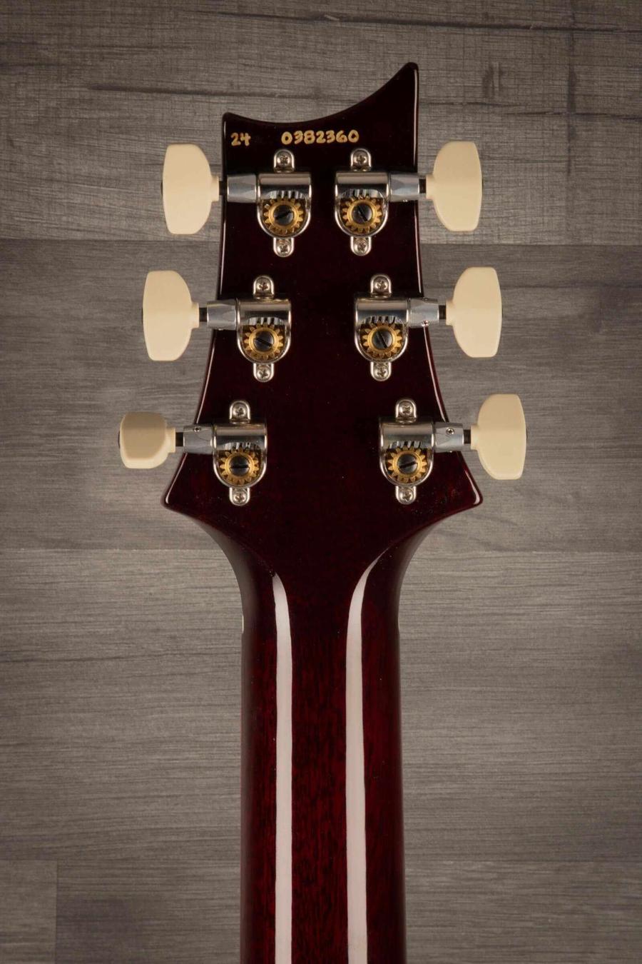 Close-up of the headstock of a USED PRS Paul's Guitar in Dark Cherry Sunburst, showcasing tuning pegs and craftsmanship.