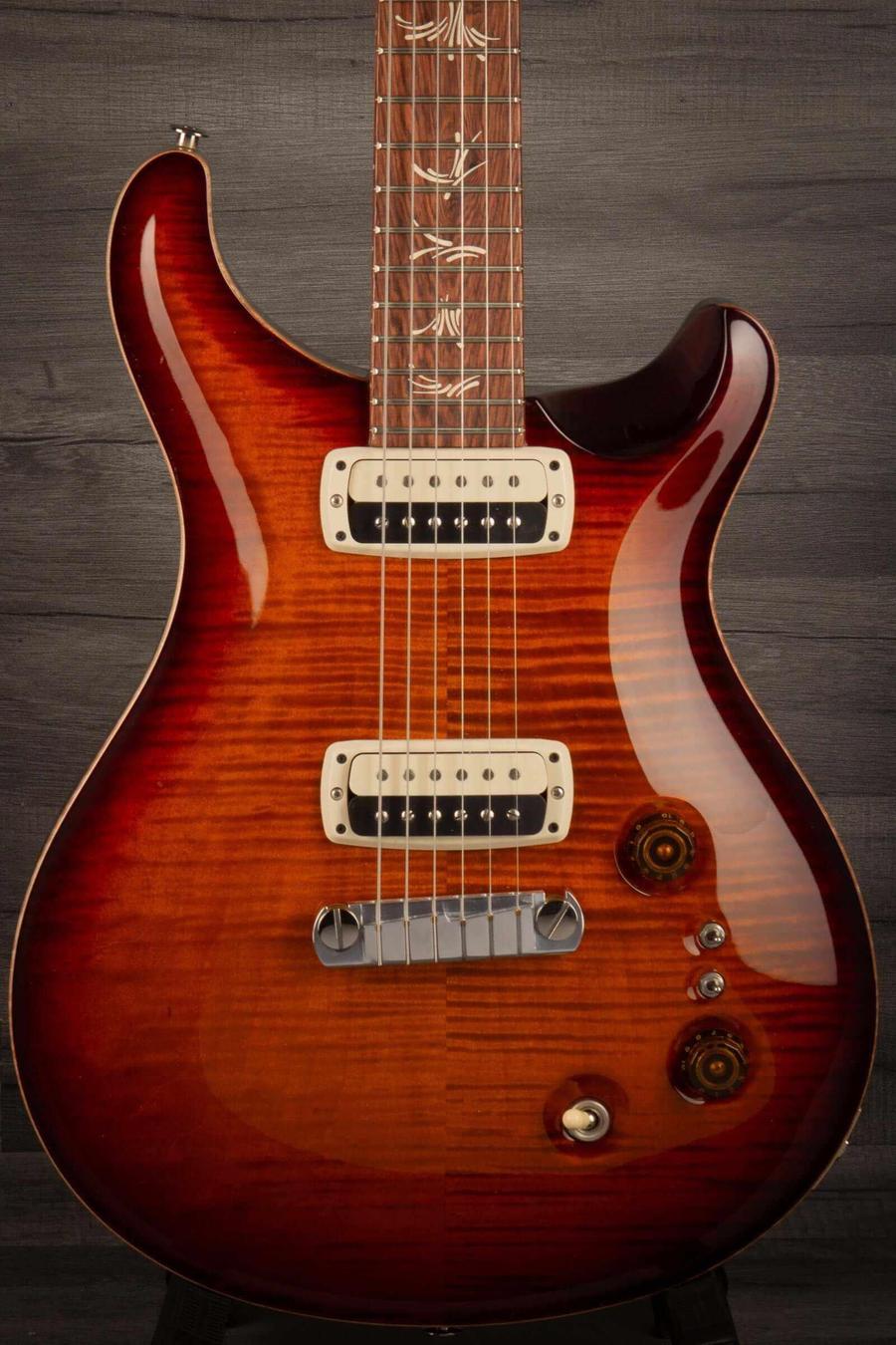 USED - PRS Paul's Guitar Dark Cherry Sunburst in stunning finish with distinctive features and intricate inlays.