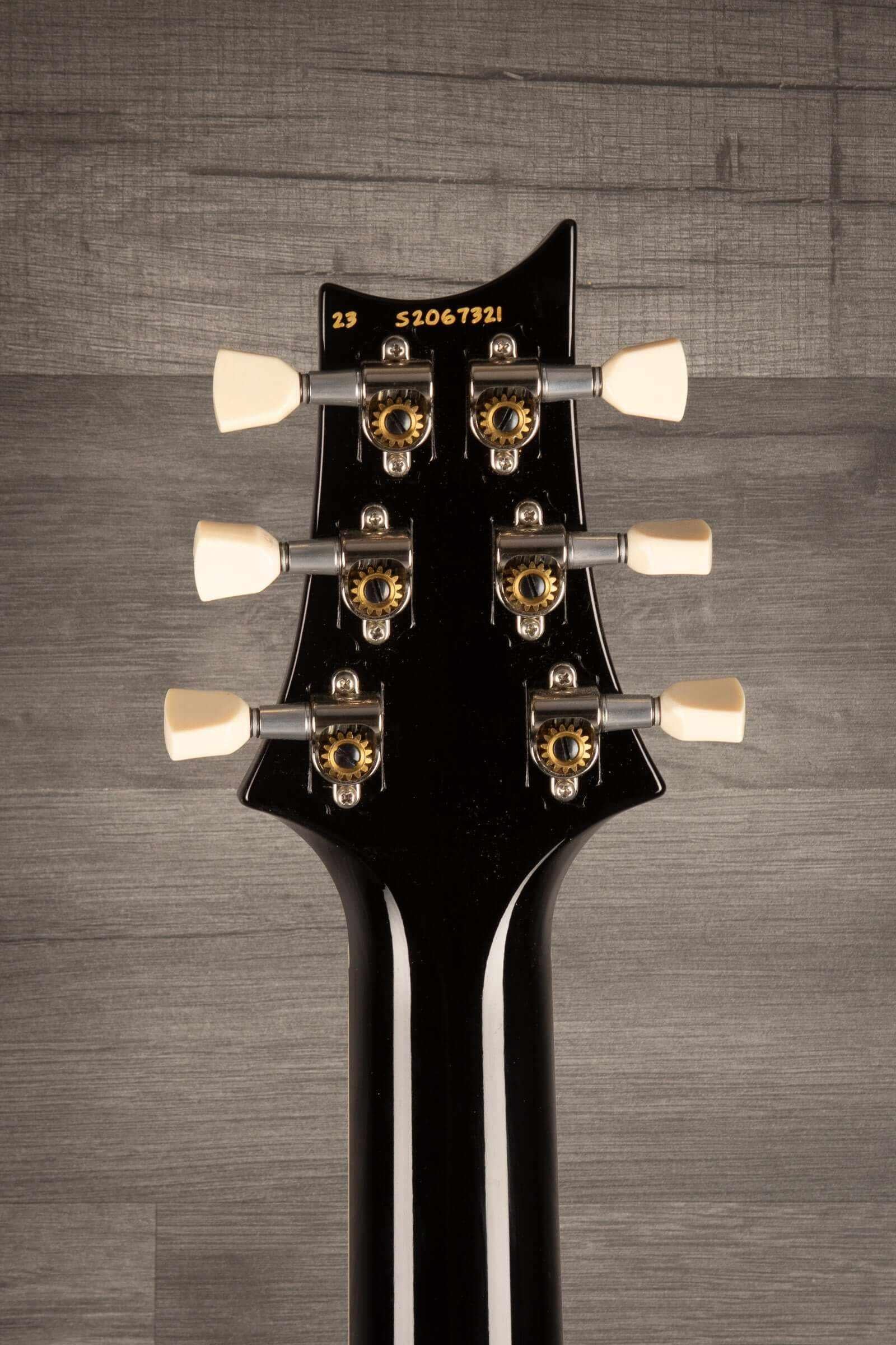 USED - PRS S2 McCarty 594 10th anniversary guitar headstock showcasing tuning pegs and detailed craftsmanship.