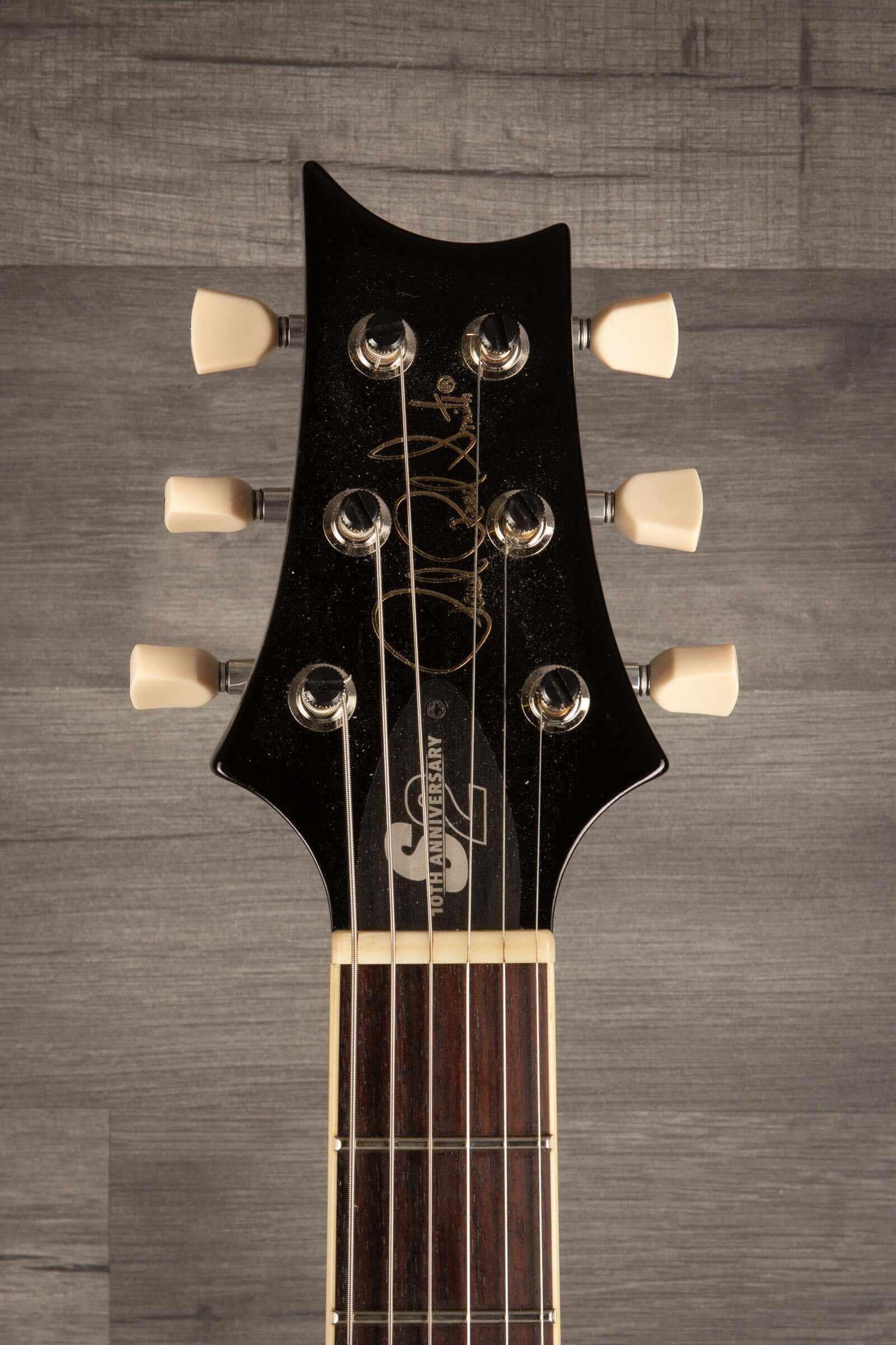 USED - PRS S2 McCarty 594 10th anniversary guitar headstock showcasing unique design and craftsmanship.