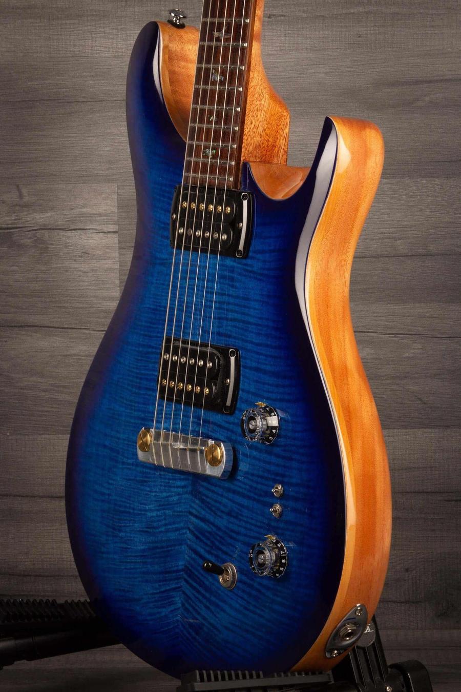 USED - PRS SE Paul’s Guitar Electric Guitar - Faded Blue Burst side view, showcasing vibrant blue finish and controls.