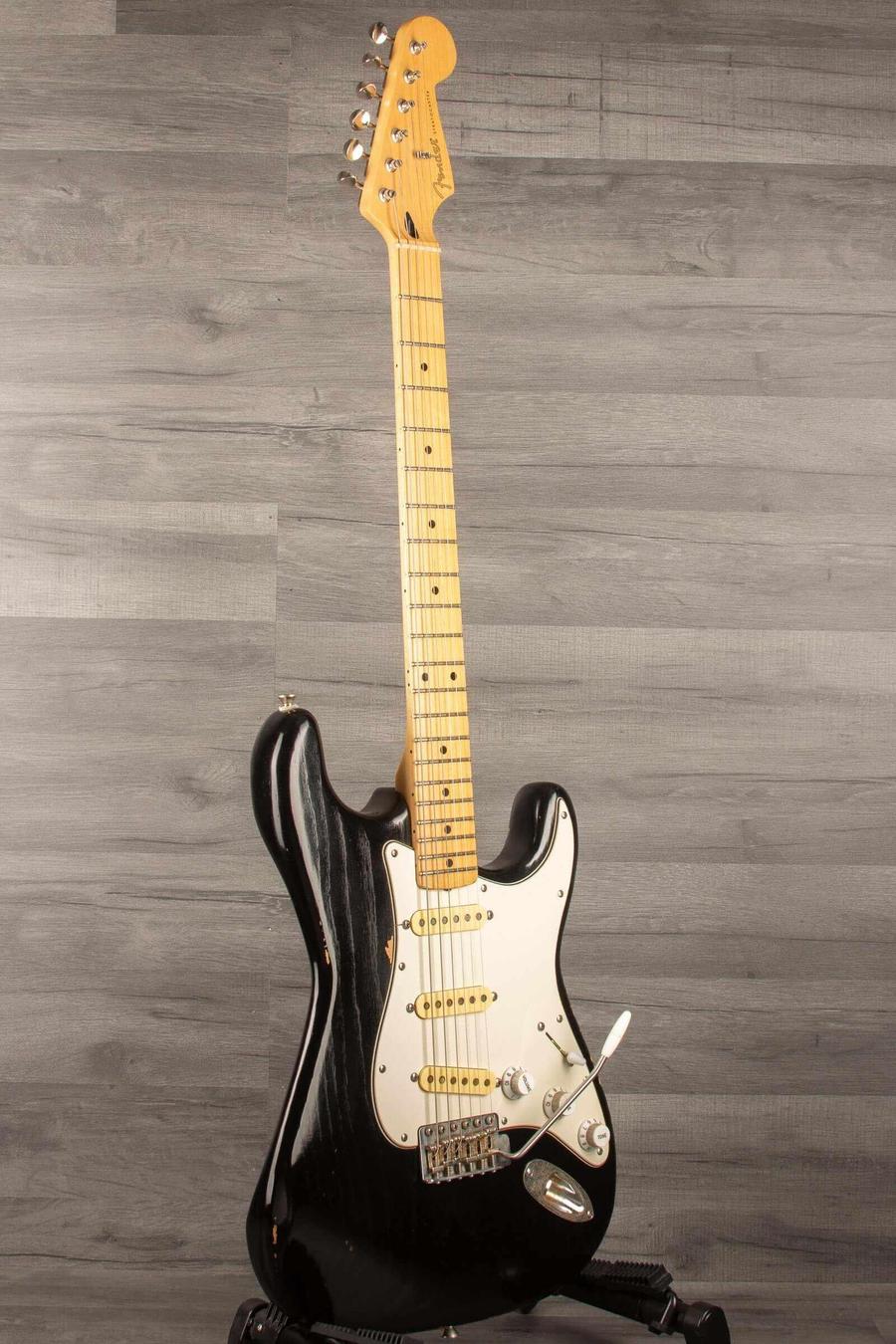 USED - Road Worn Partscaster Stratocaster Black guitar with light ash body and nitro finish in excellent condition.