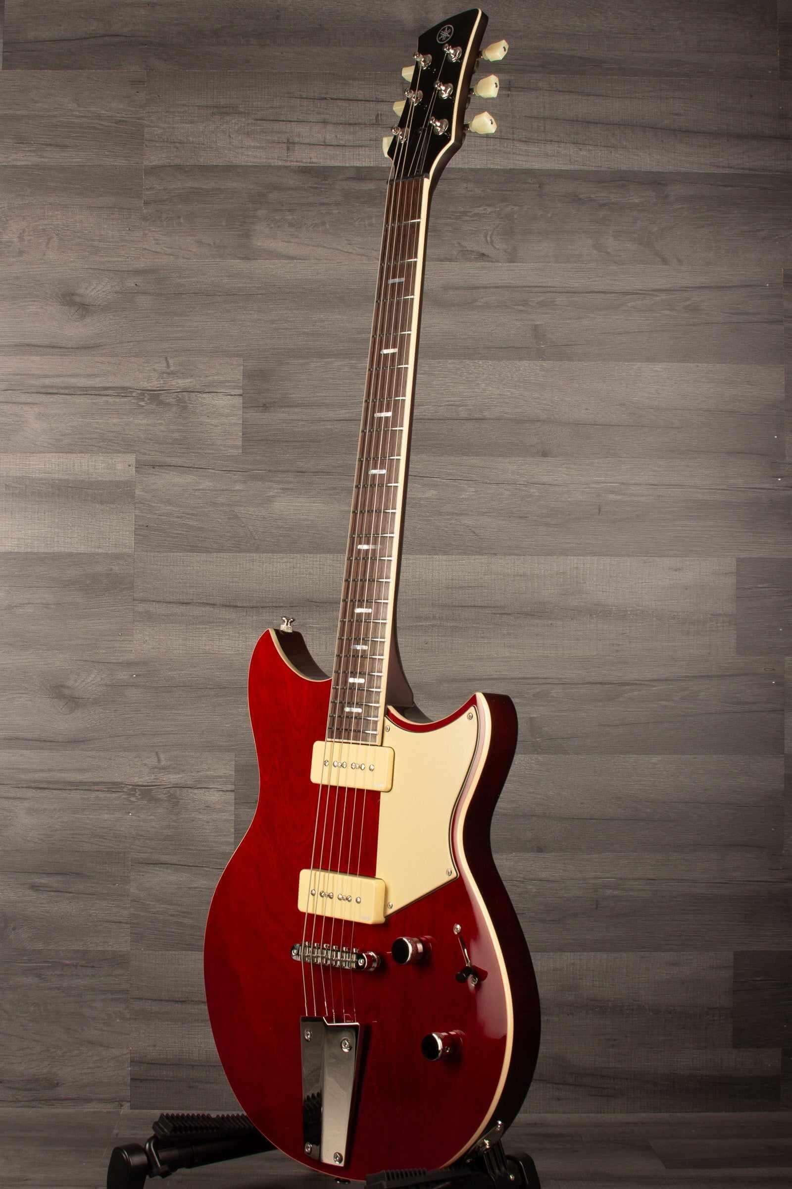 Yamaha RSS02T Revstar - Fire Red guitar featuring custom tailpiece and P90 pickups.