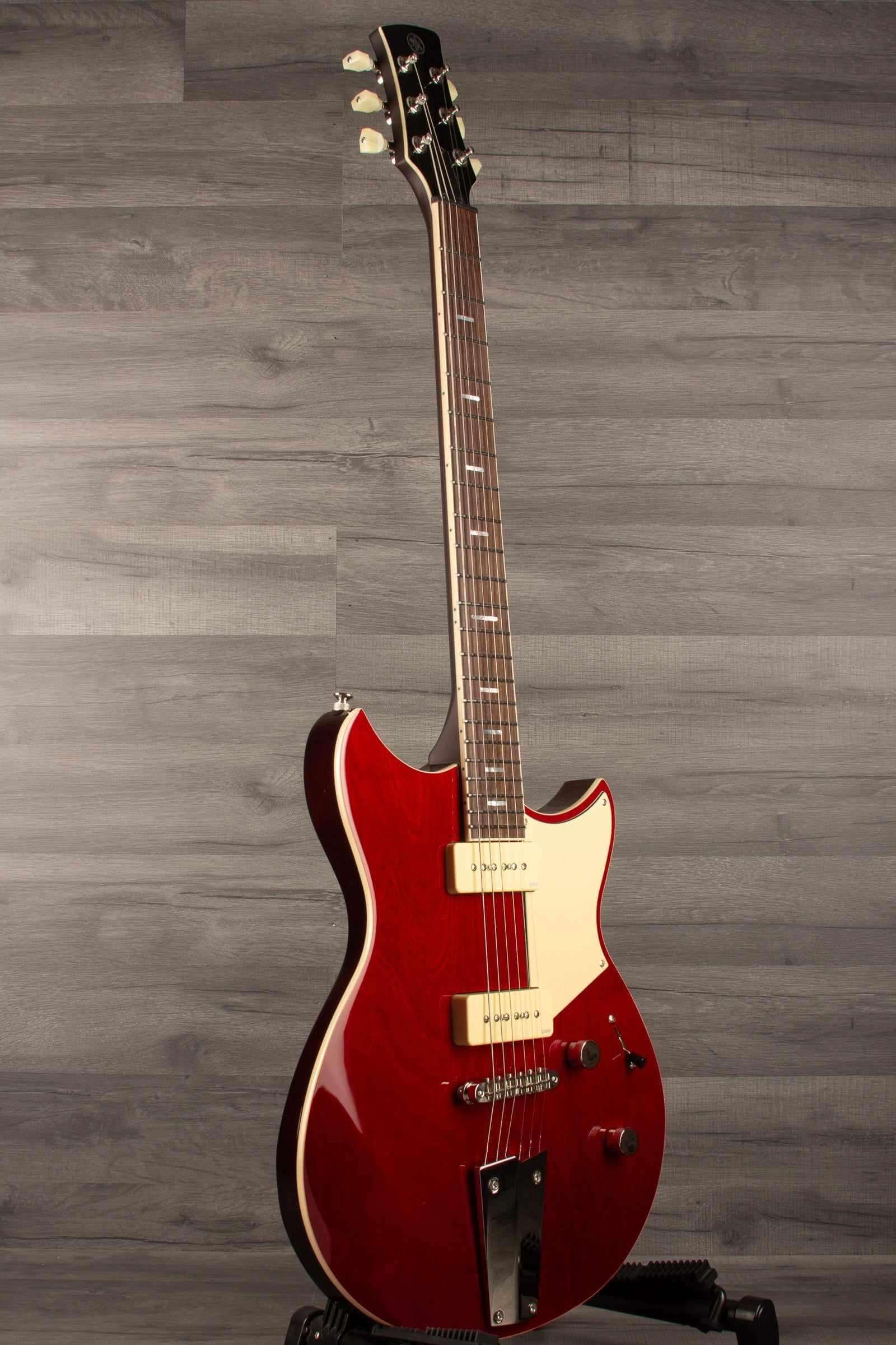 Yamaha RSS02T Revstar - Fire Red electric guitar with custom tailpiece and P90 pickups.
