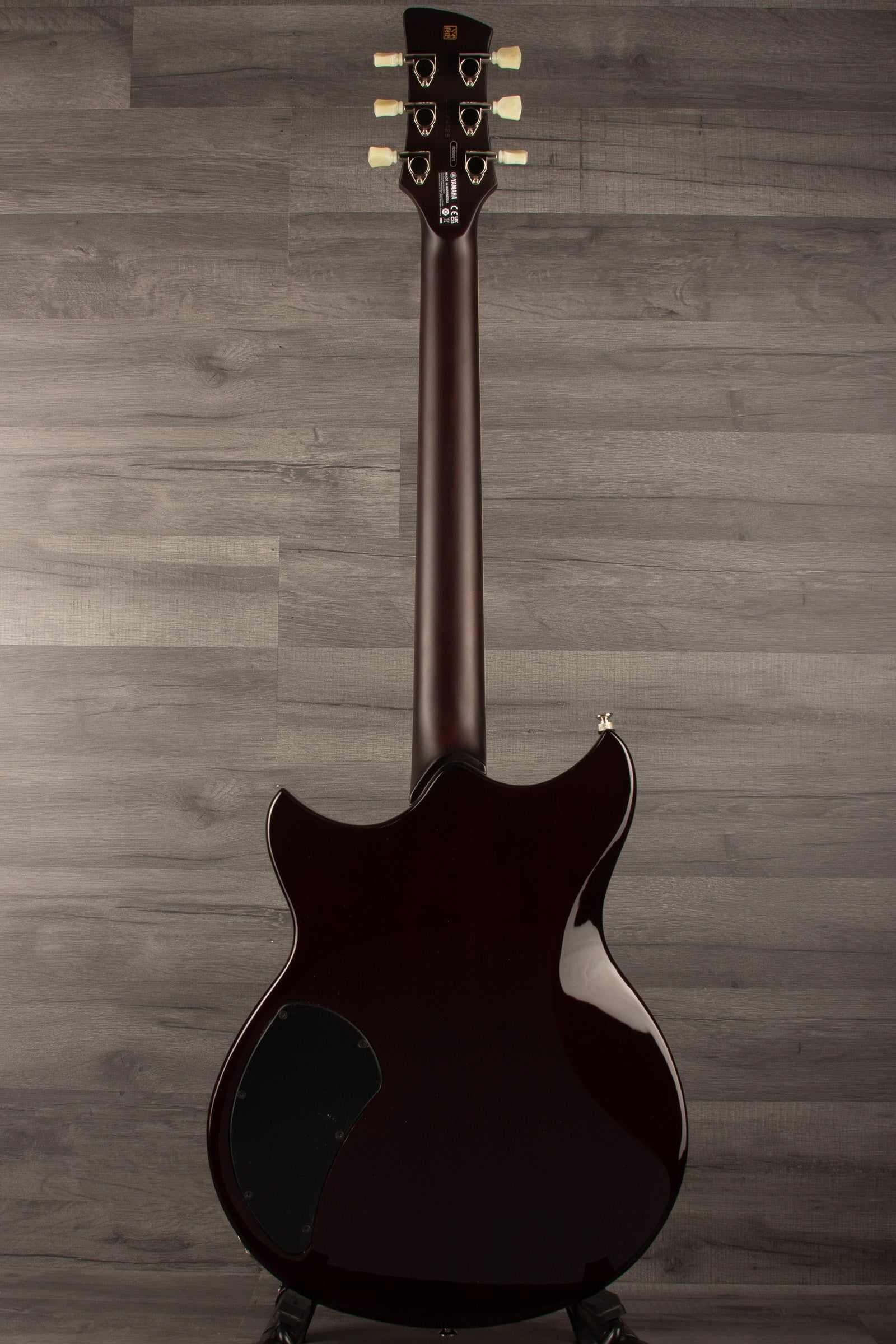 Yamaha RSS02T Revstar - Vintage White guitar back view showcasing its smooth body design and neck.