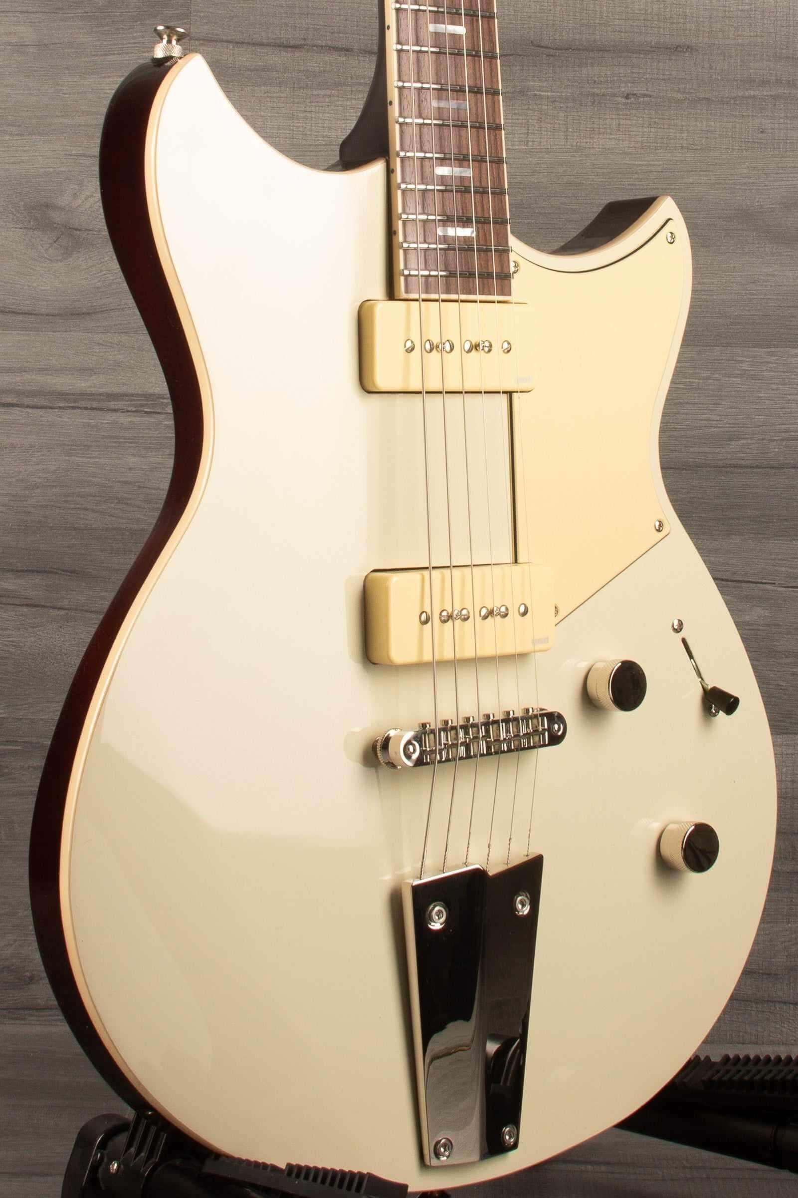 Yamaha RSS02T Revstar - Vintage White, showcasing the custom tailpiece and P90 pickups.