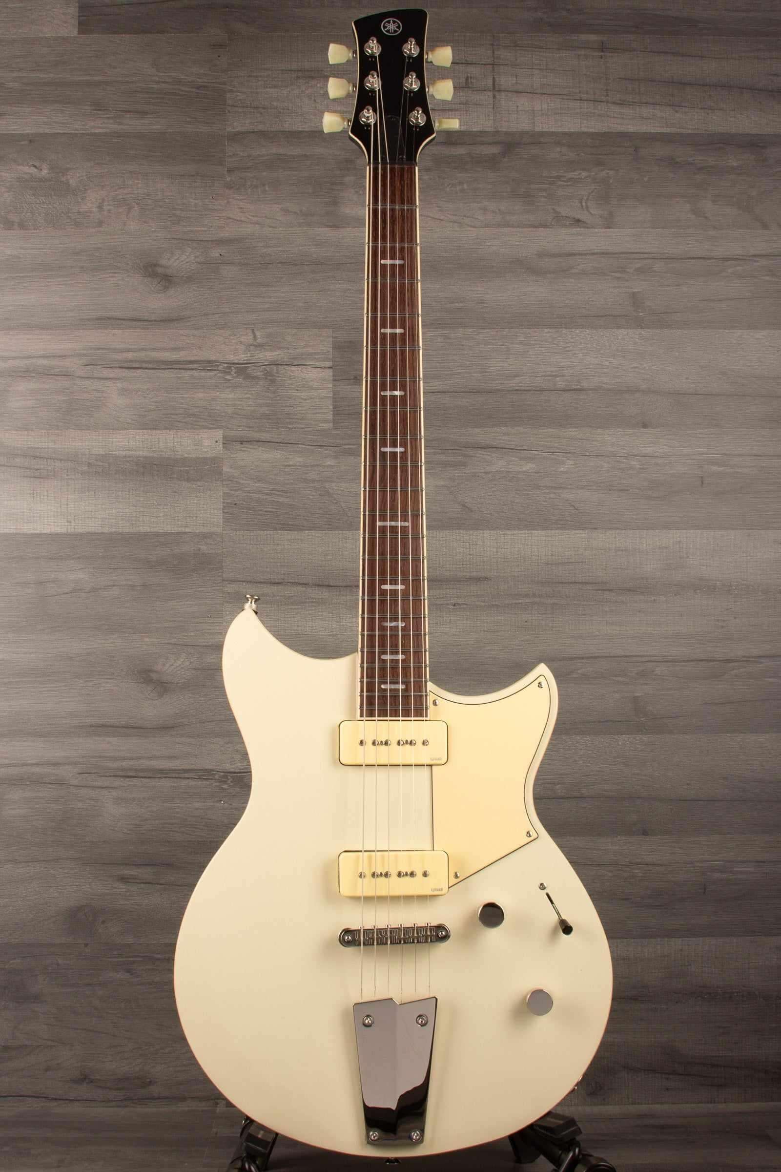 Yamaha RSS02T Revstar - Vintage White guitar with P90 pickups and unique body design for rock music enthusiasts.