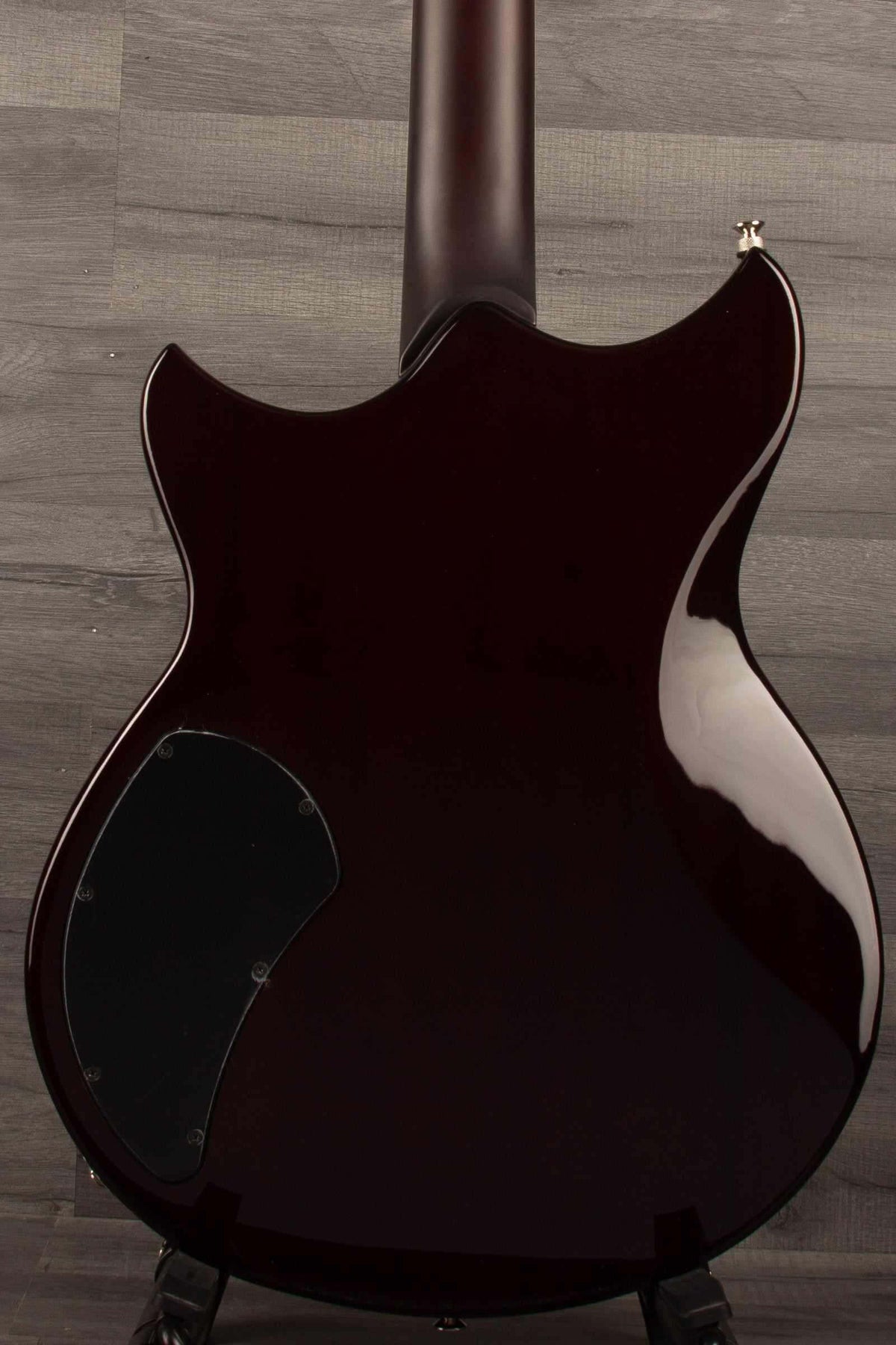 Yamaha RSS20 Revstar - Mist Green guitar back view showcasing its unique body shape and finish.