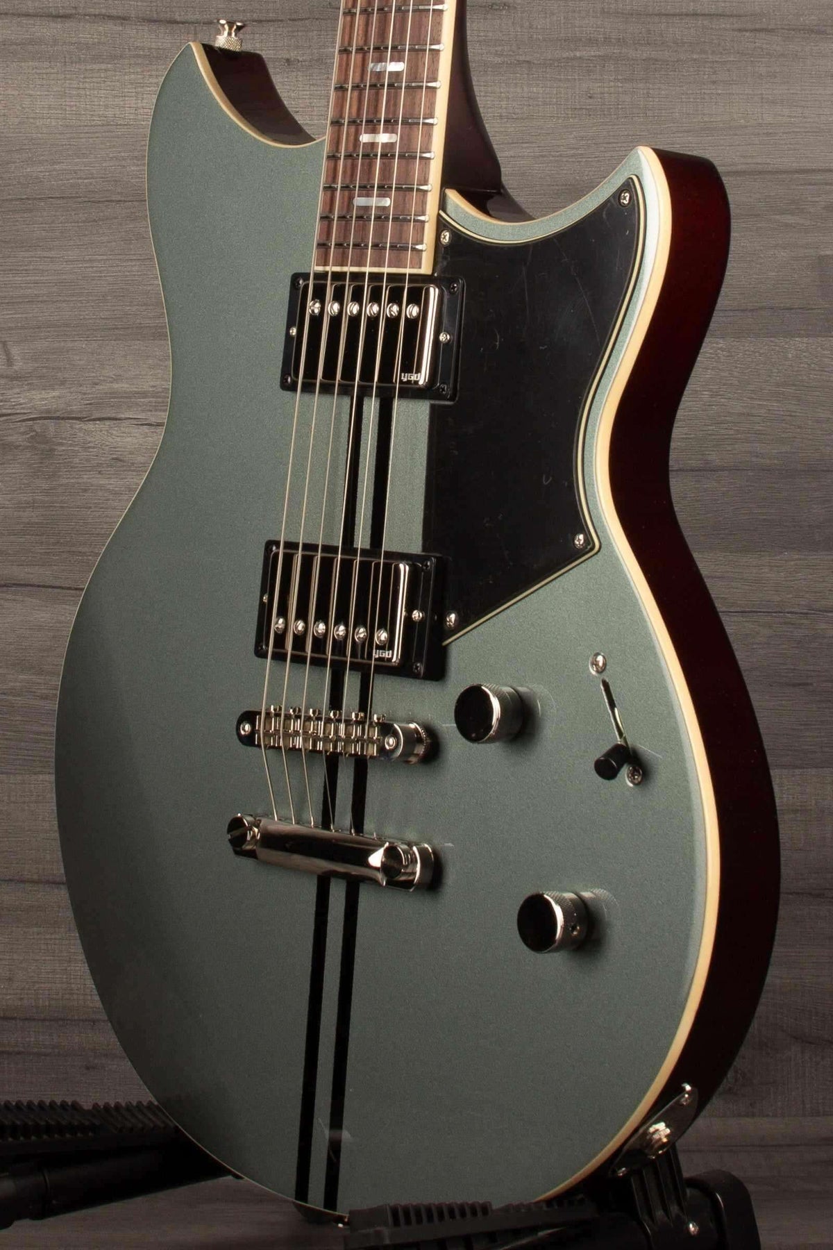 Yamaha RSS20 Revstar - Mist Green guitar with unique body shape and Alnico Humbuckers showcased.