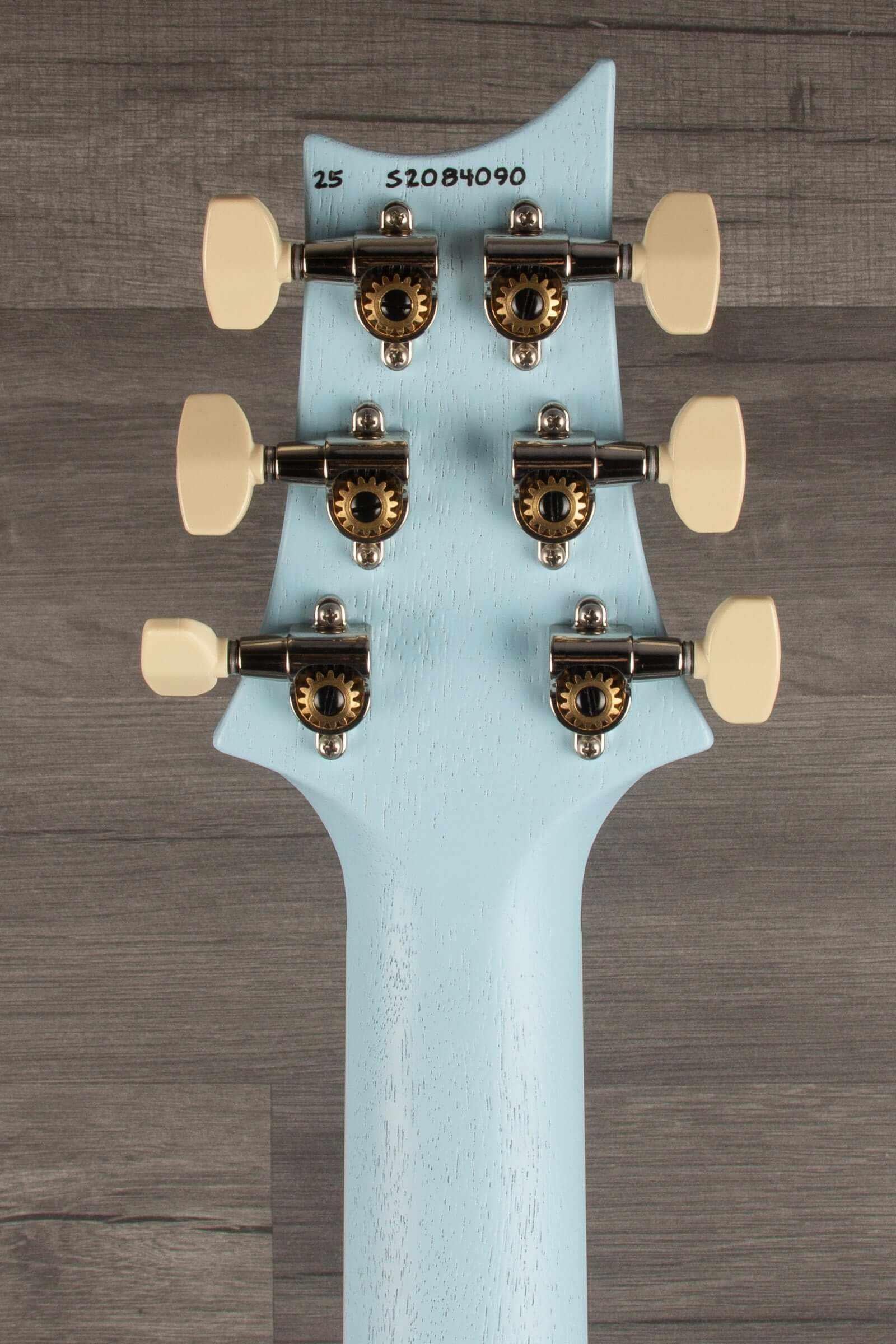 PRS - S2 Mira 594 Satin Cloudburst guitar headstock showing tuning pegs and unique finish.