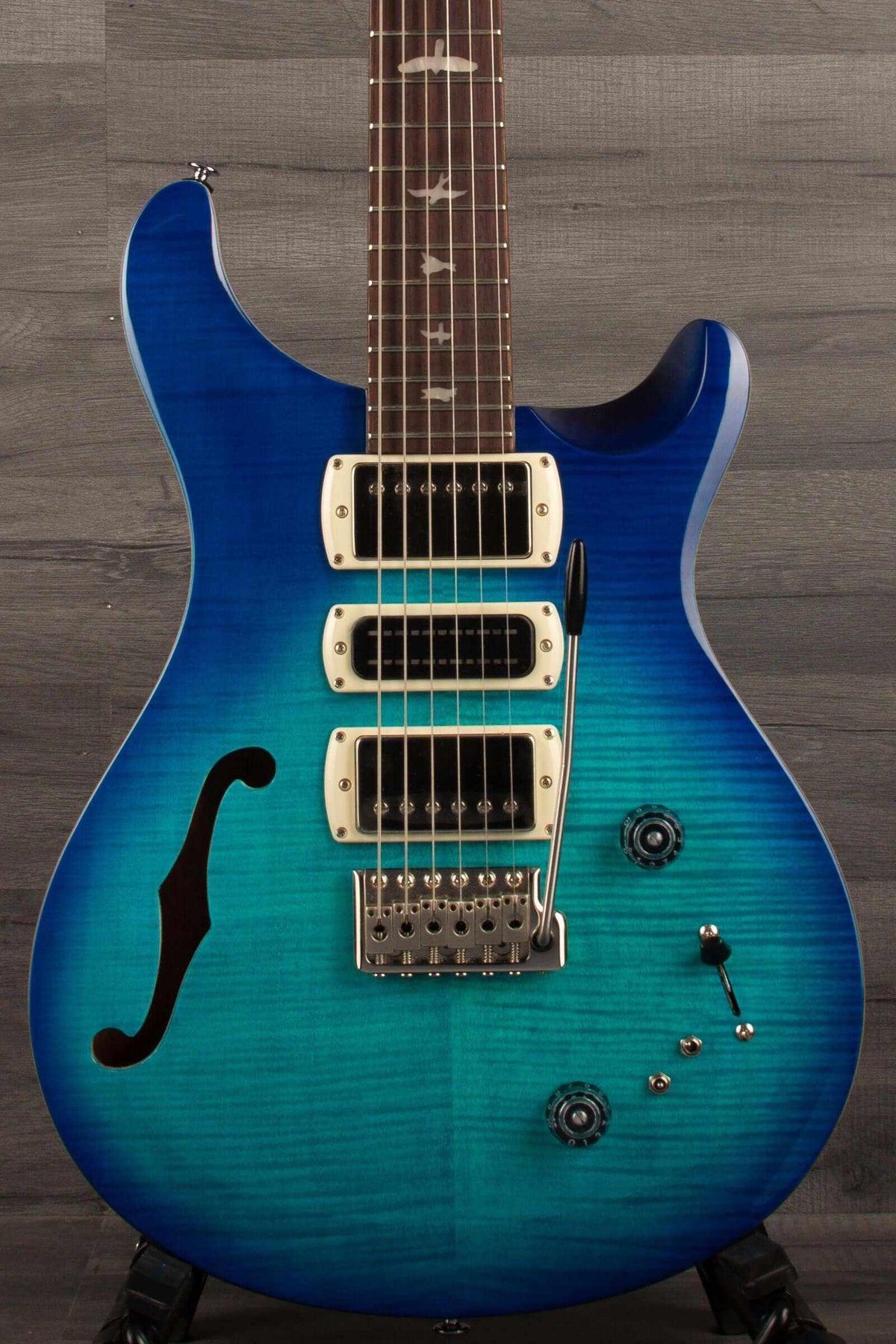 PRS SE Special Semi Hollow - Lake Blue electric guitar featuring semi-hollow body and vibrant blue finish.