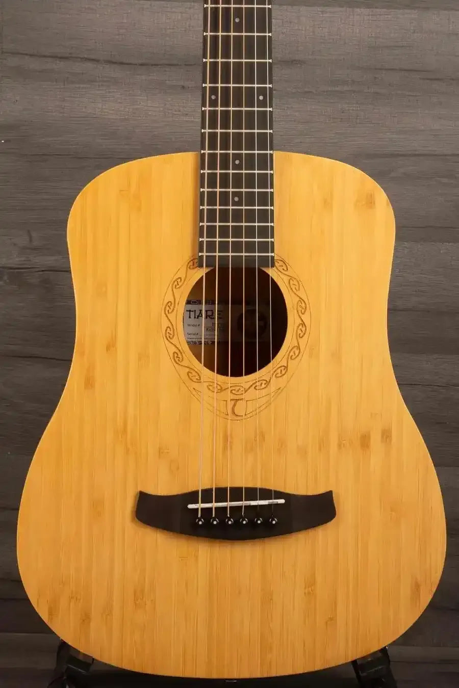 Tanglewood TWT18 Tiare Travel Acoustic, Natural Bamboo front view showcasing its unique bamboo body.