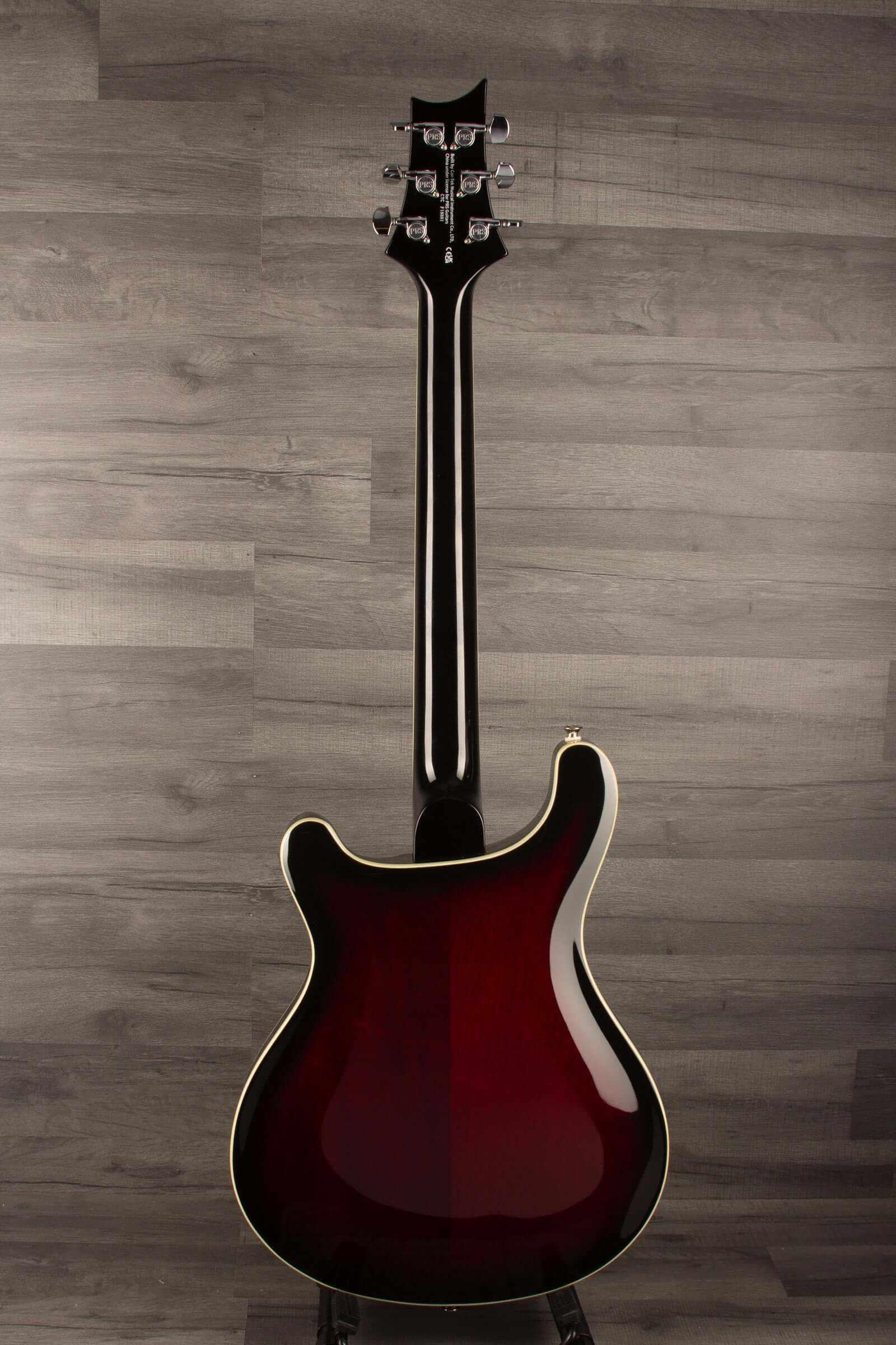 Back view of USED - PRS SE Hollowbody Standard Fire Red Burst guitar showcasing the mahogany body and sleek design.