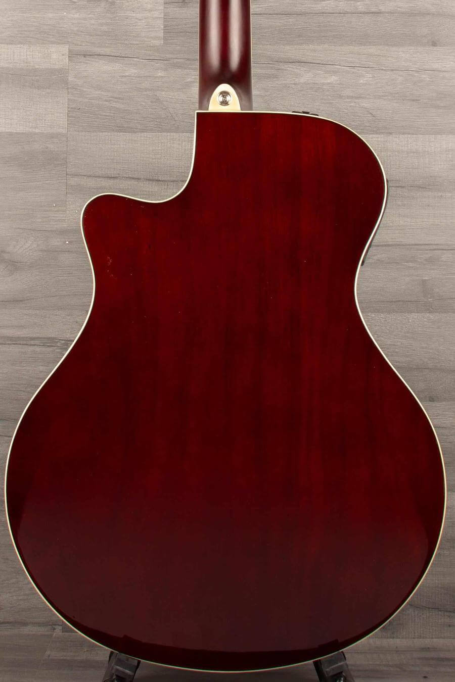 Back view of USED Yamaha APX600 Electro Acoustic Guitar in Natural finish, showcasing its sleek cutaway design.