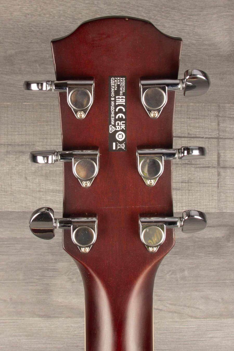 Back of USED Yamaha APX600 Electro Acoustic Guitar showing tuning pegs and neck details.