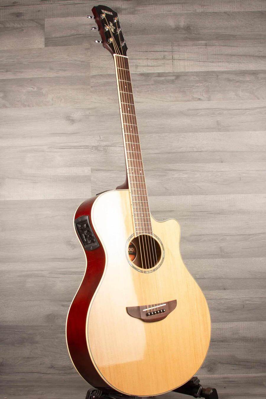 USED - Yamaha APX600 Electro Acoustic Guitar in Natural finish, showcasing its sleek design and playability.