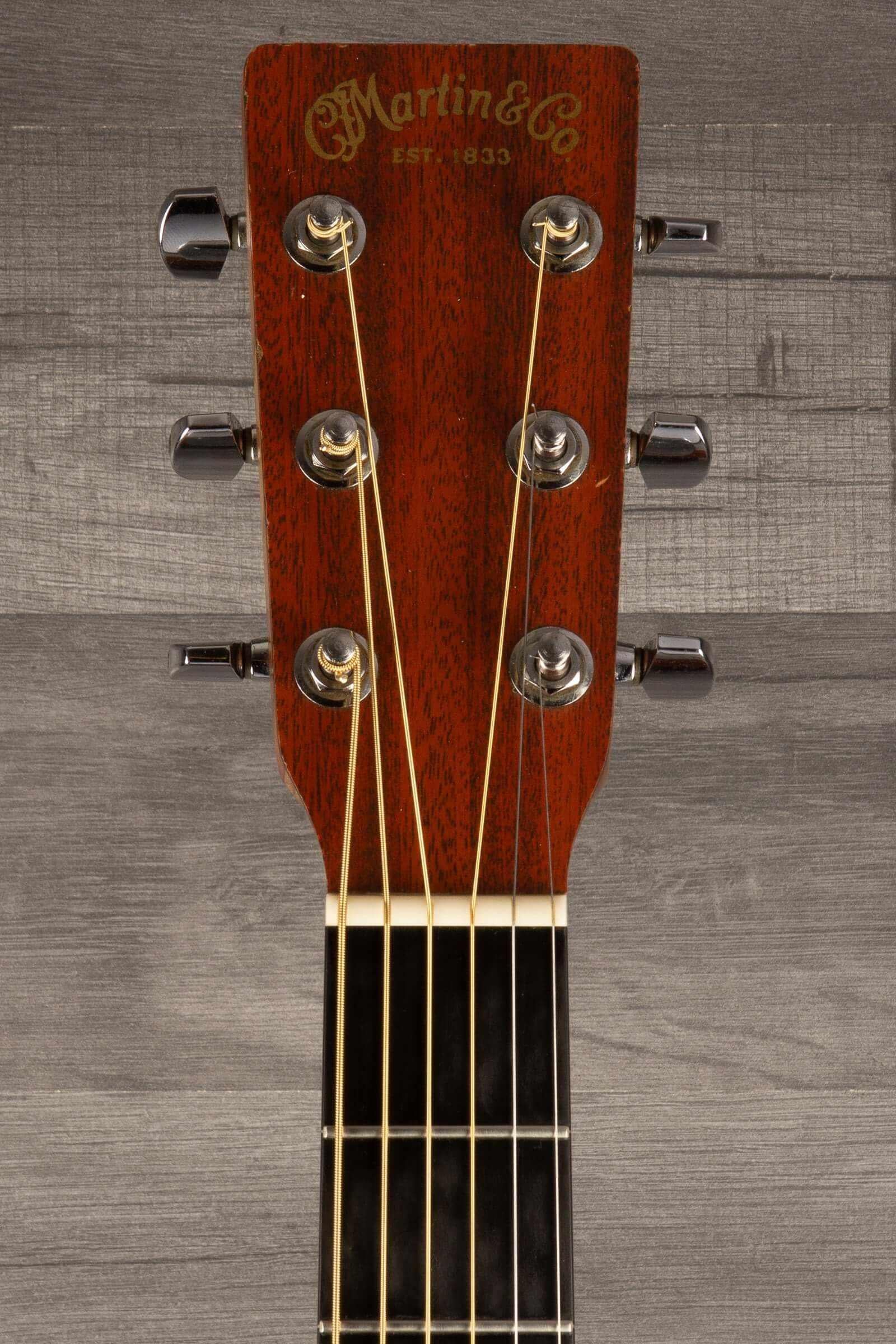 USED - Martin 000X1 inc LR Baggs M1 & hard case headstock view with tuning pegs and strings.