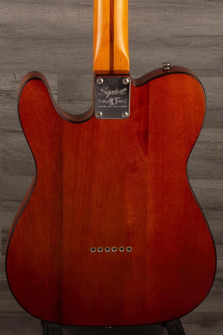 Back view of USED Squier 40th Anniversary Telecaster vintage edition in Satin Mocha with clean finish and visible hardware.