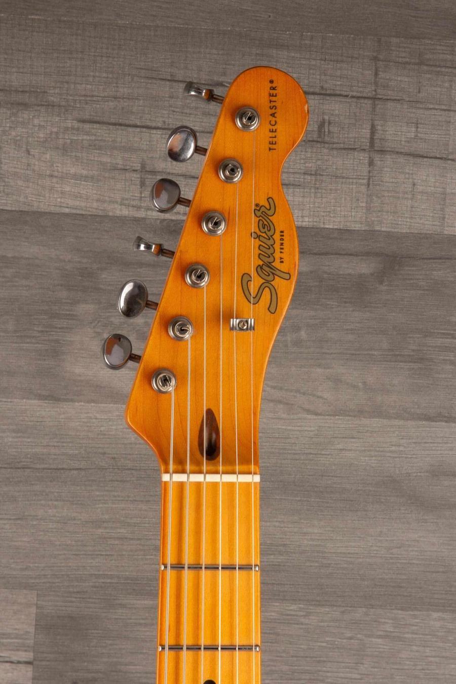 Used Squier 40th Anniversary Telecaster vintage edition headstock, Satin Mocha finish, in good condition.